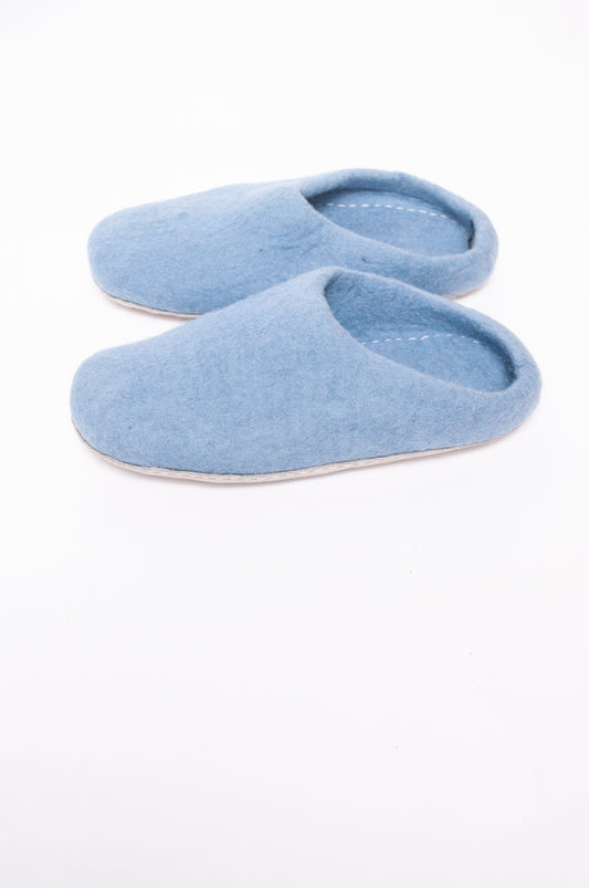 Wool felt slip on slippers in baby blue.