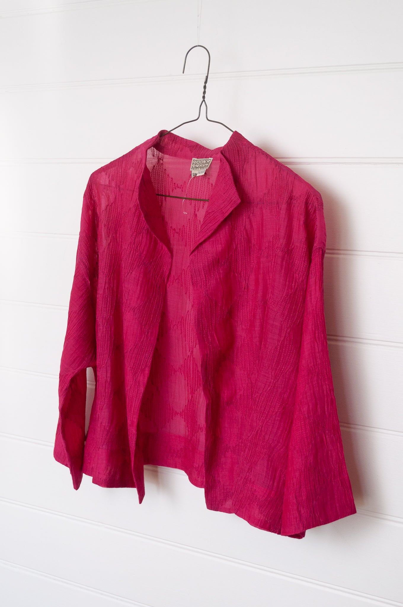 Neeru Kumar cotton silk embroidered unlined cropped jacket in brilliant pink.