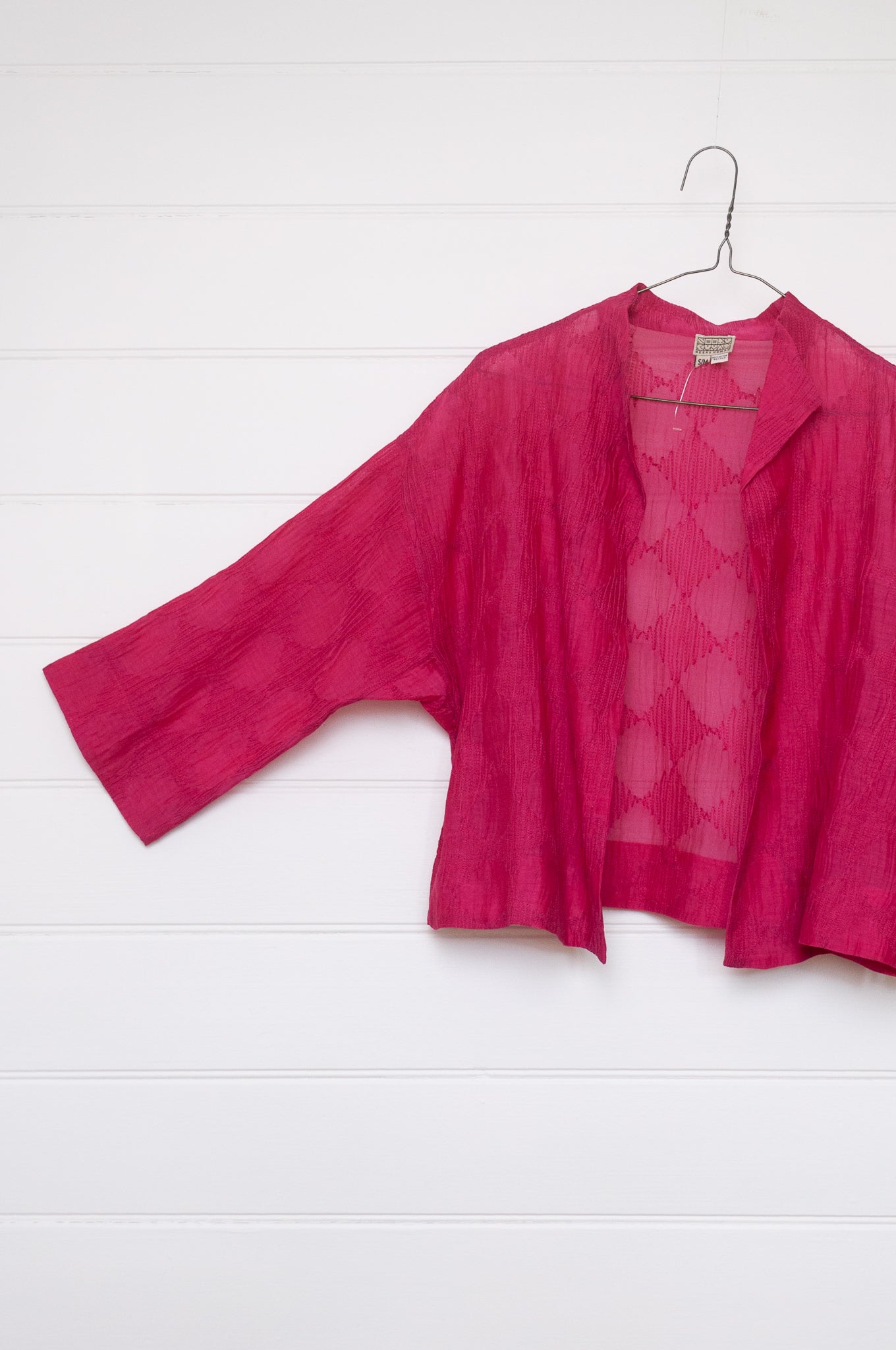 Neeru Kumar cotton silk embroidered unlined cropped jacket in brilliant pink.