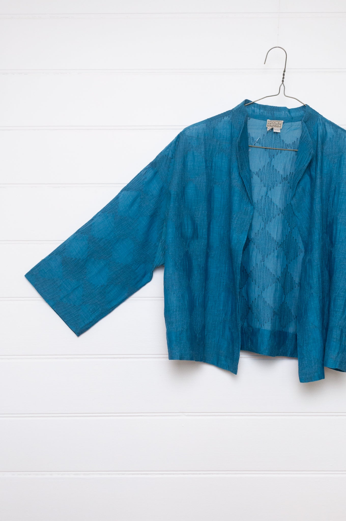 Neeru Kumar cotton silk embroidered unlined cropped jacket in blue.