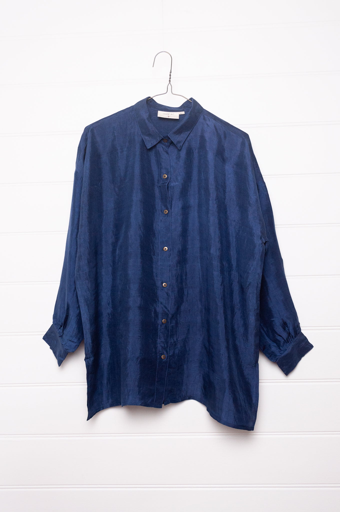 Studio Within x Juniper Hearth oversized pure silk button up long sleeved shirt in black.