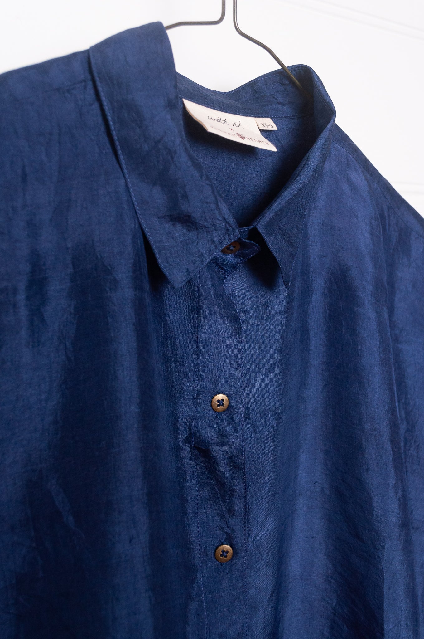 Studio Within x Juniper Hearth oversized pure silk button up long sleeved shirt in black.