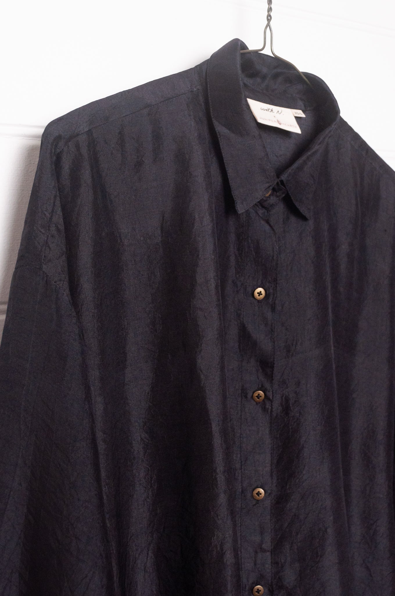 Studio Within x Juniper Hearth oversized pure silk button up long sleeved shirt in black.