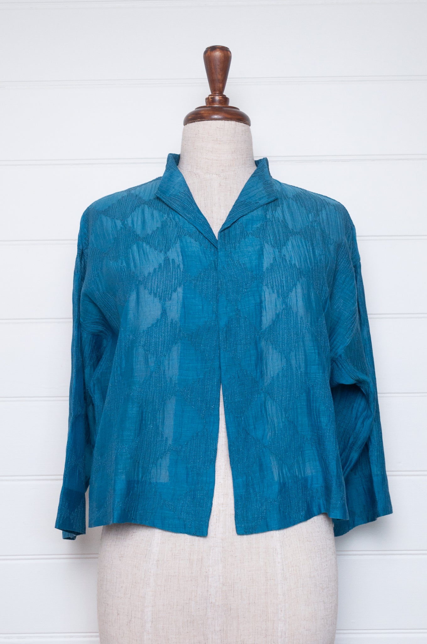 Neeru Kumar cotton silk embroidered unlined cropped jacket in blue.