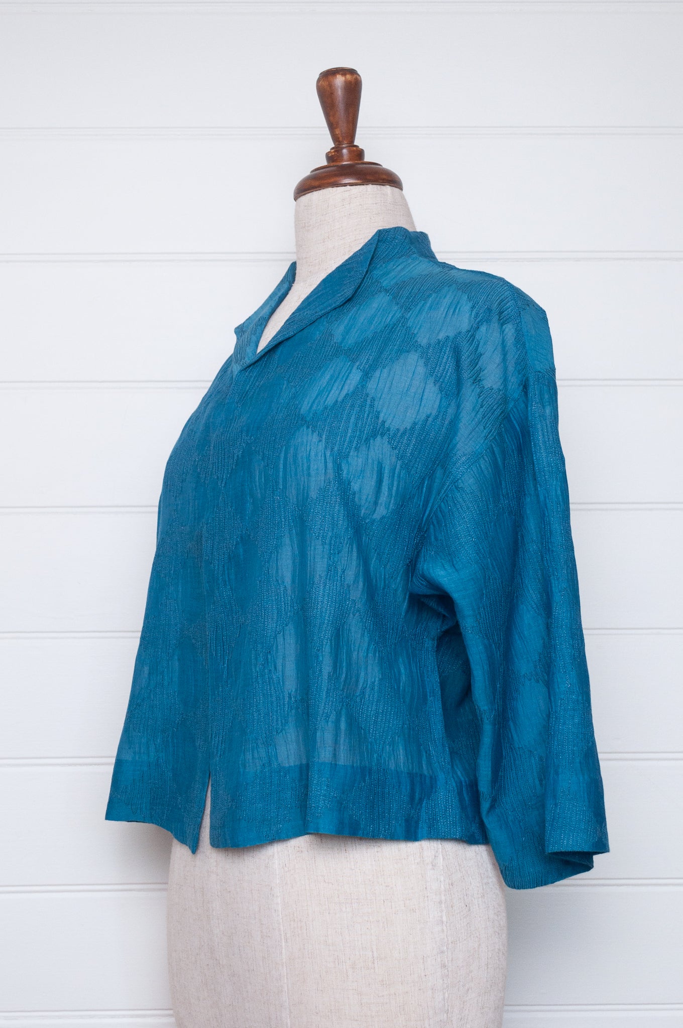 Neeru Kumar cotton silk embroidered unlined cropped jacket in blue.