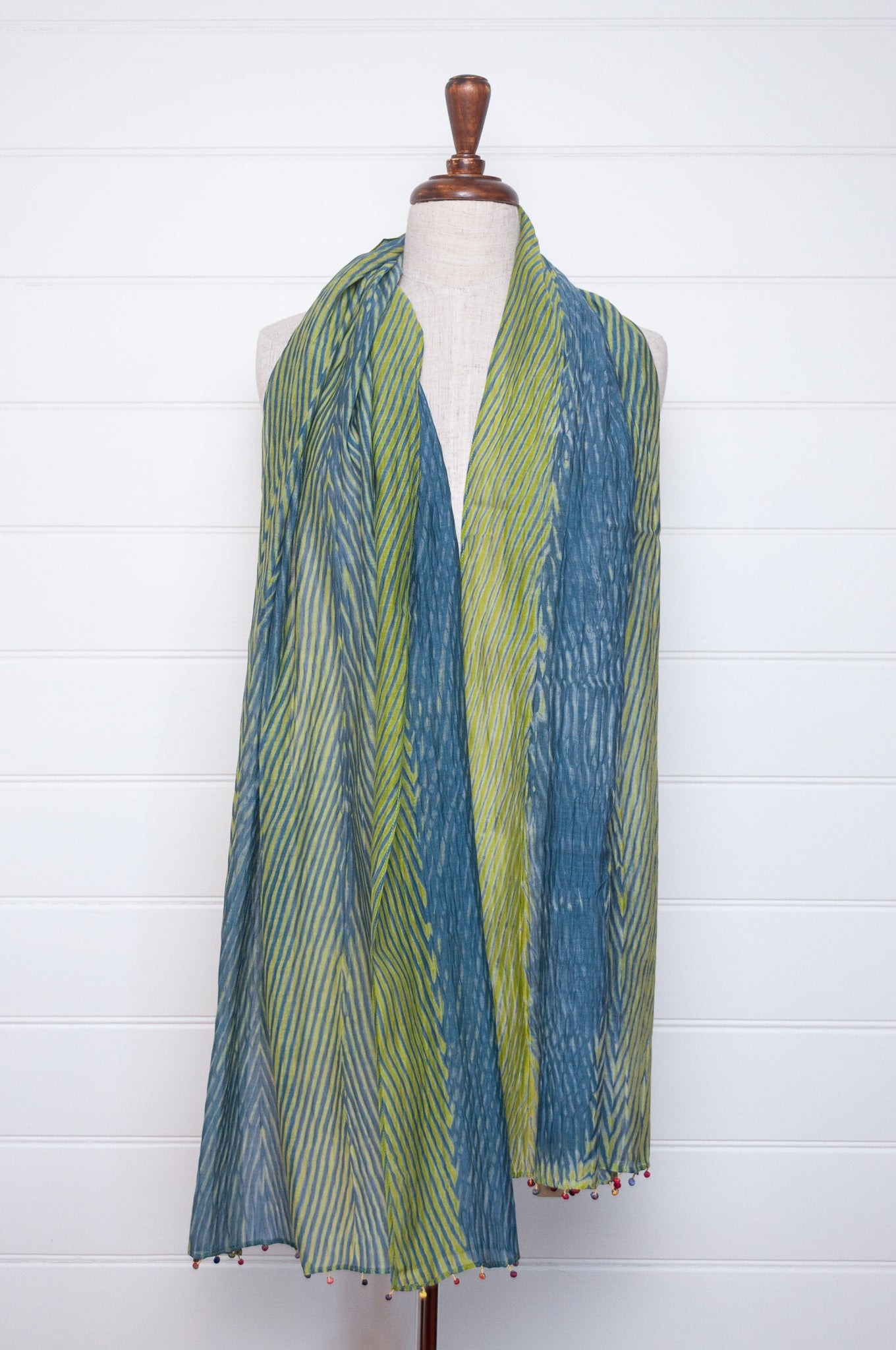 Neeru Kumar shibori dyed cotton silk scarf in blue and green with fabric beads.