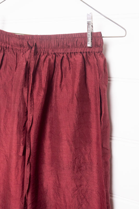 Studio Within x Juniper Hearth mulberry silk elastic waist pants in oxblood red.
