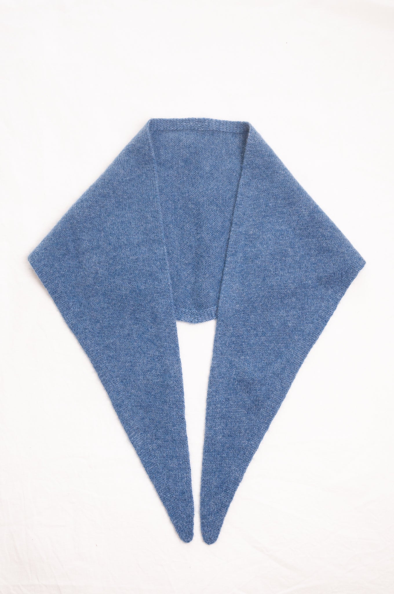 Cashmere triangle neck scarf in denim blue.