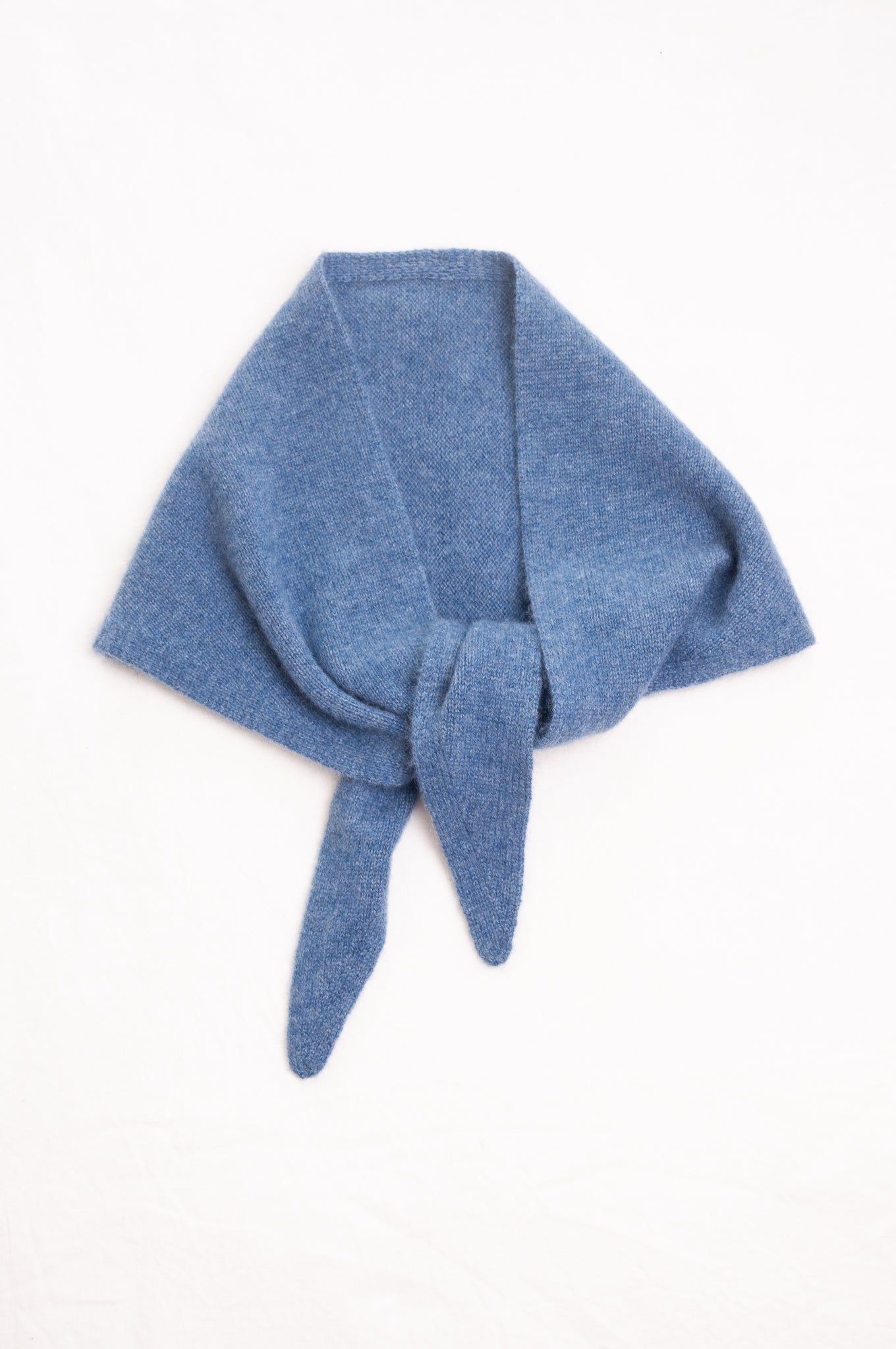Cashmere triangle neck scarf in denim blue.