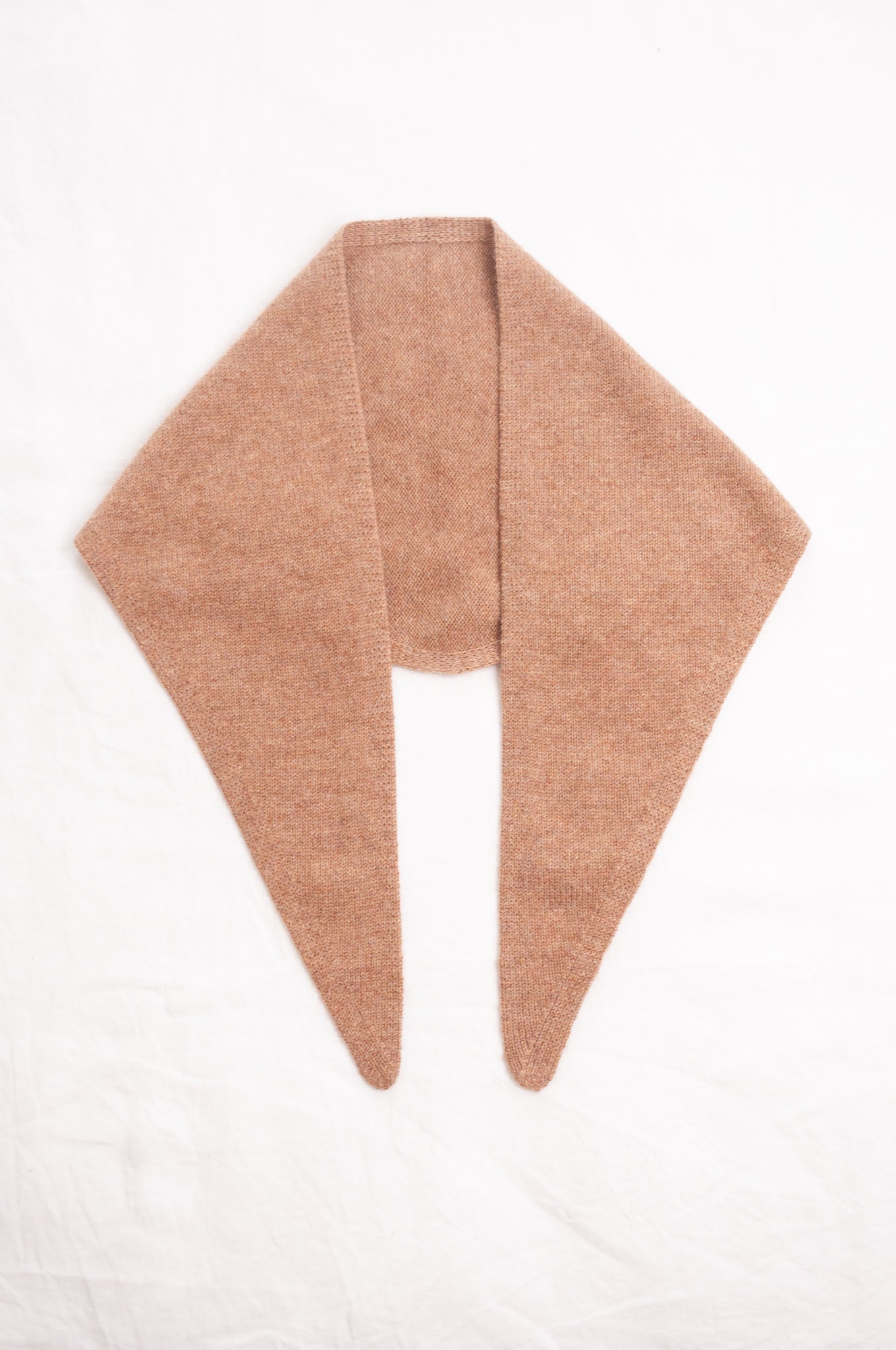Cashmere triangle neck scarf in camel light tan brown.