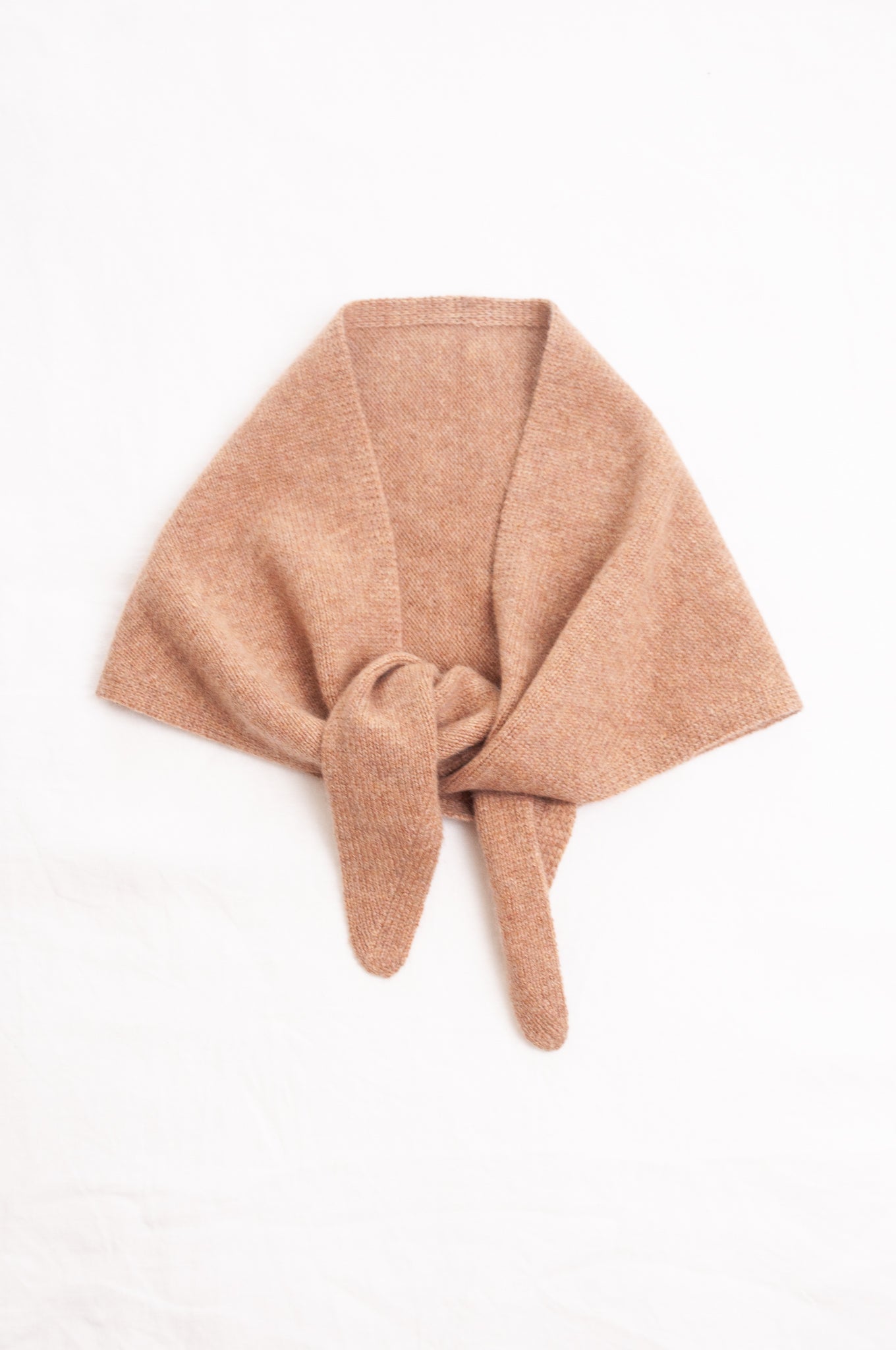 Cashmere triangle neck scarf in camel light tan brown.