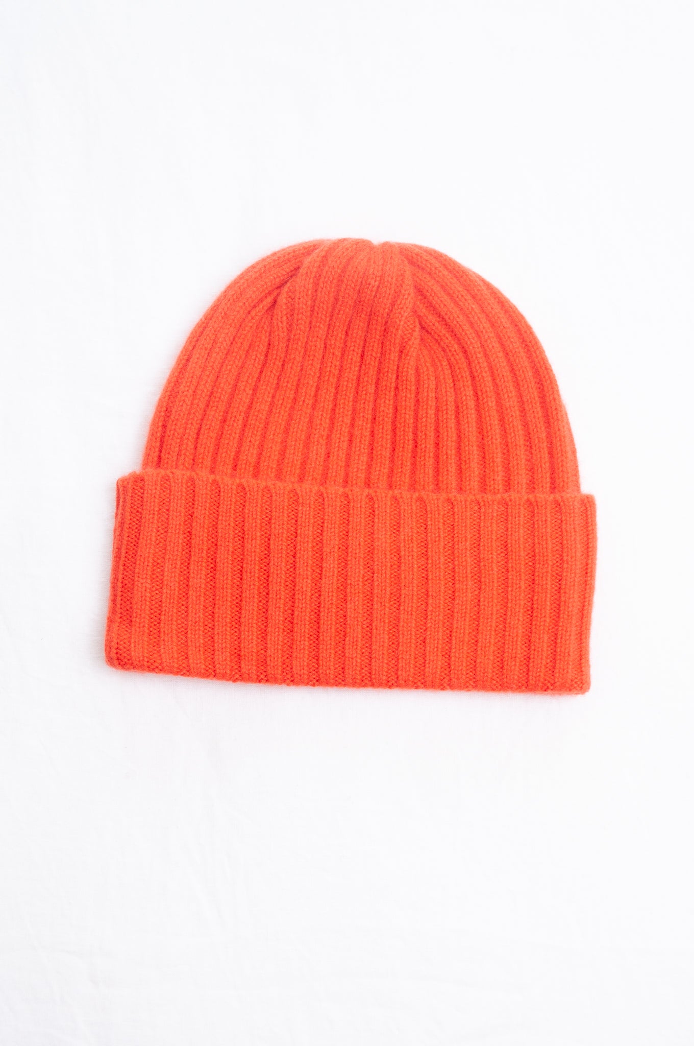 Juniper Hearth ribbed knit cashmere beanie in tangerine, orange red