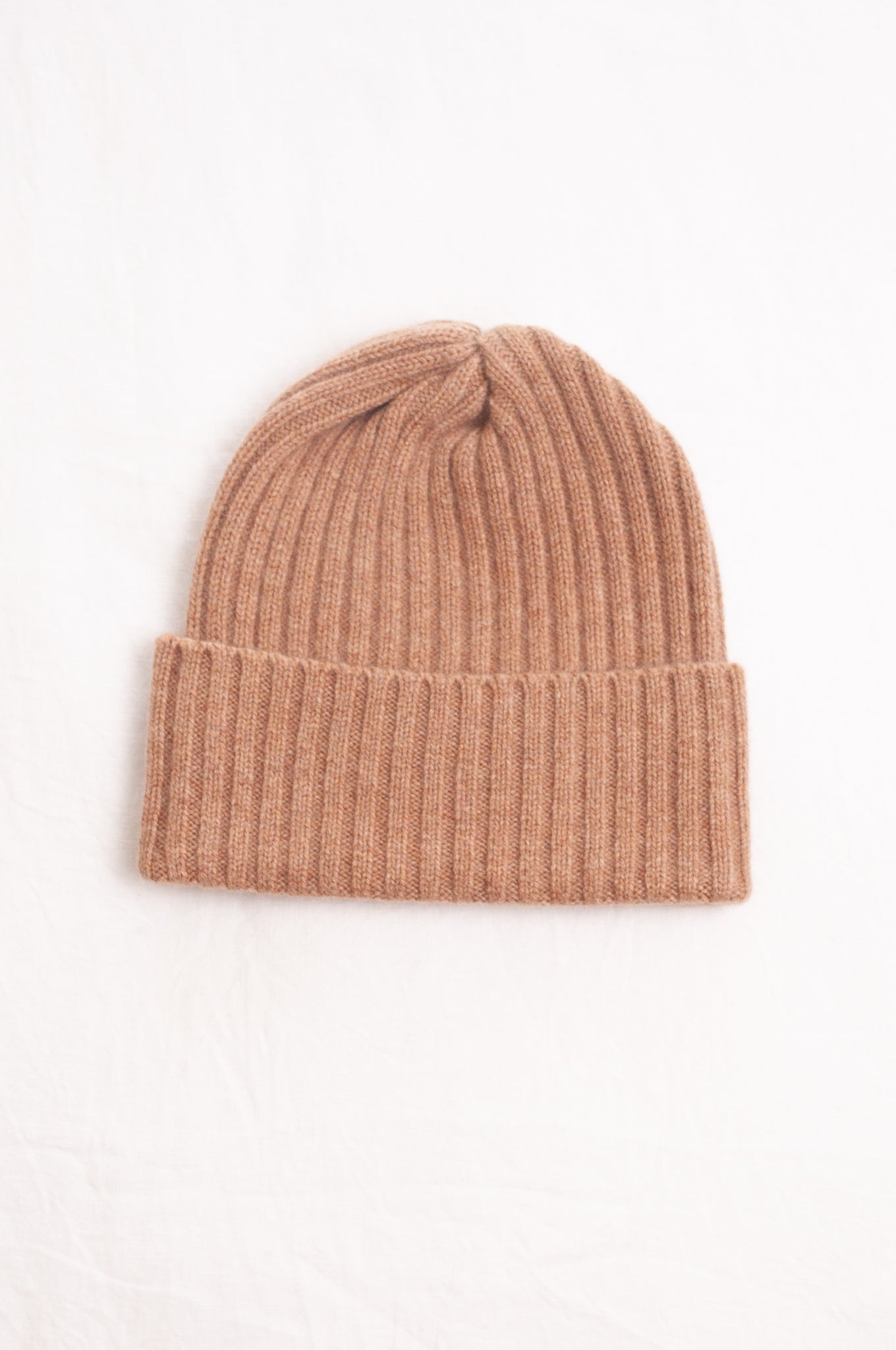 Juniper Hearth ribbed knit cashmere beanie in camel, light tan.