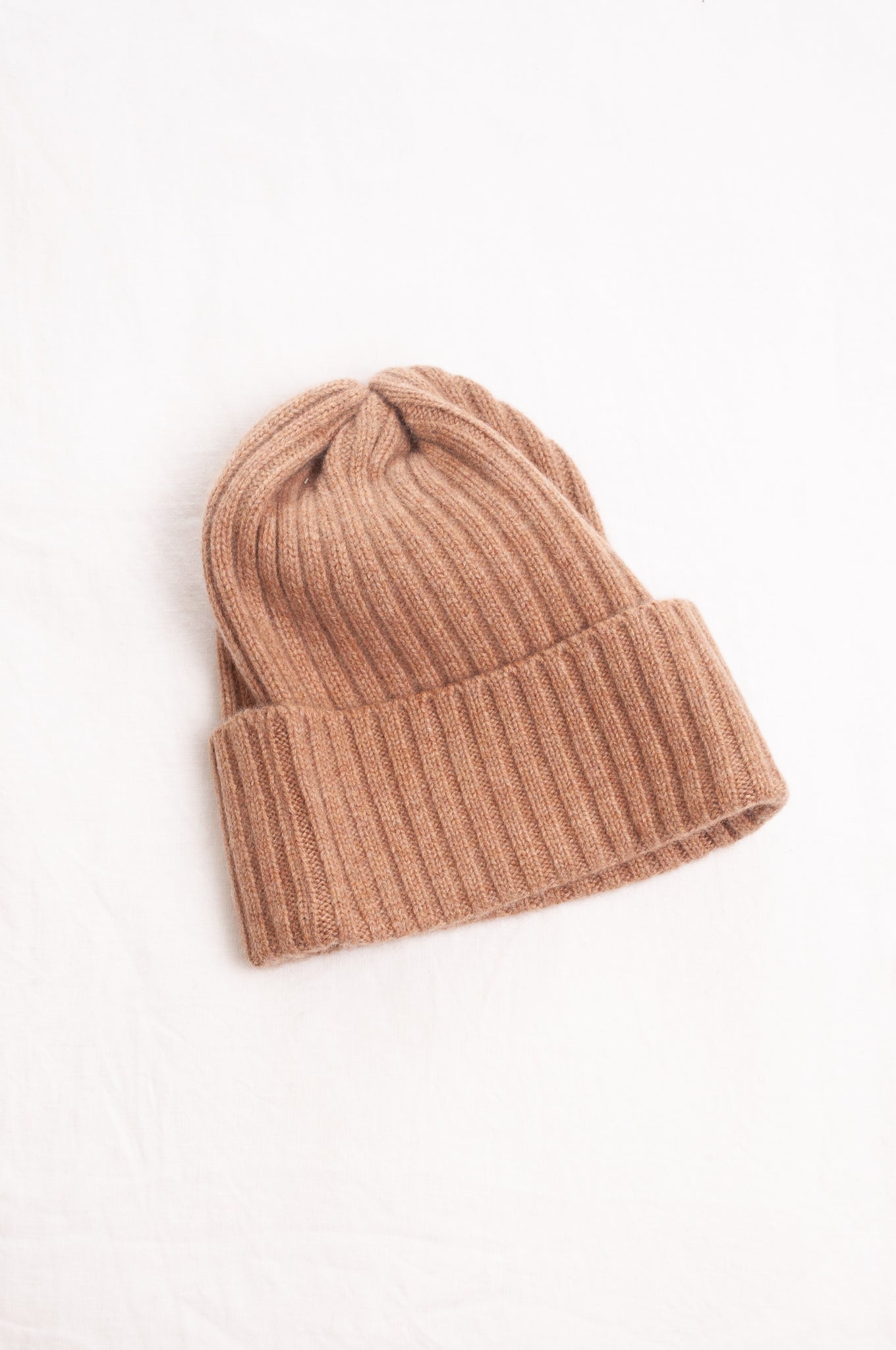 Juniper Hearth ribbed knit cashmere beanie in camel, light tan.