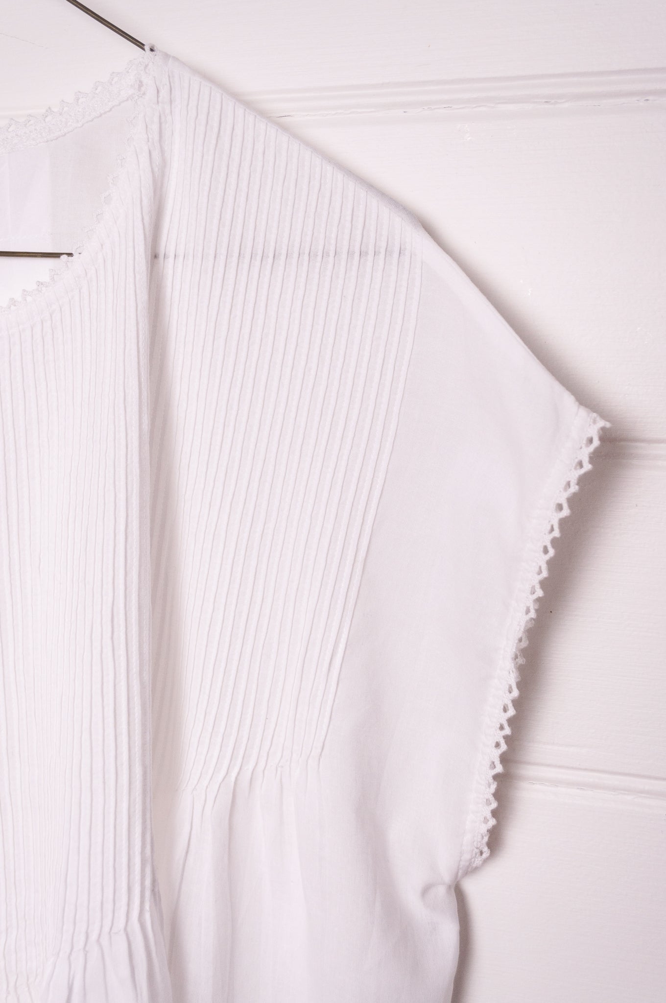 DVE Indra fine cotton pin tuck one size blouse in white.