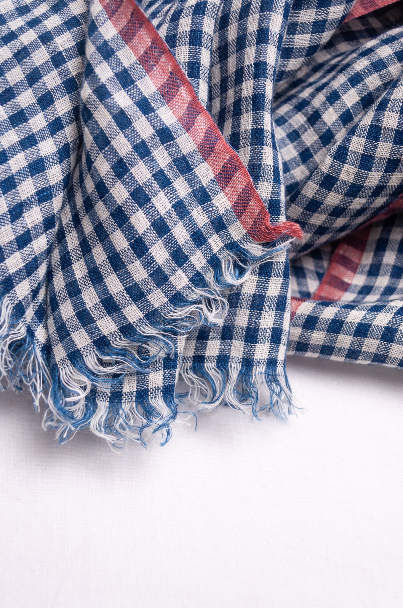 DVE handloom linen scarf in indigo and white check.