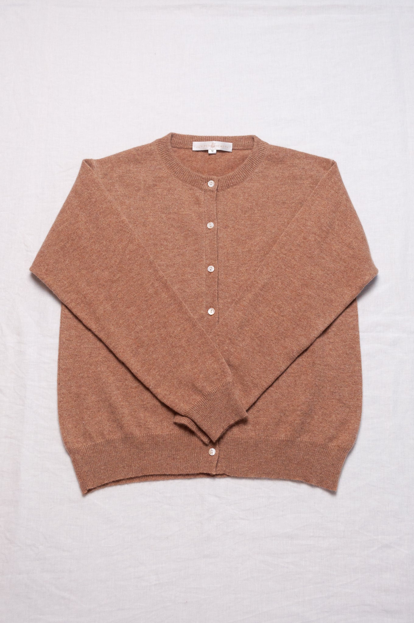Cashmere button up cardigan in camel brown.