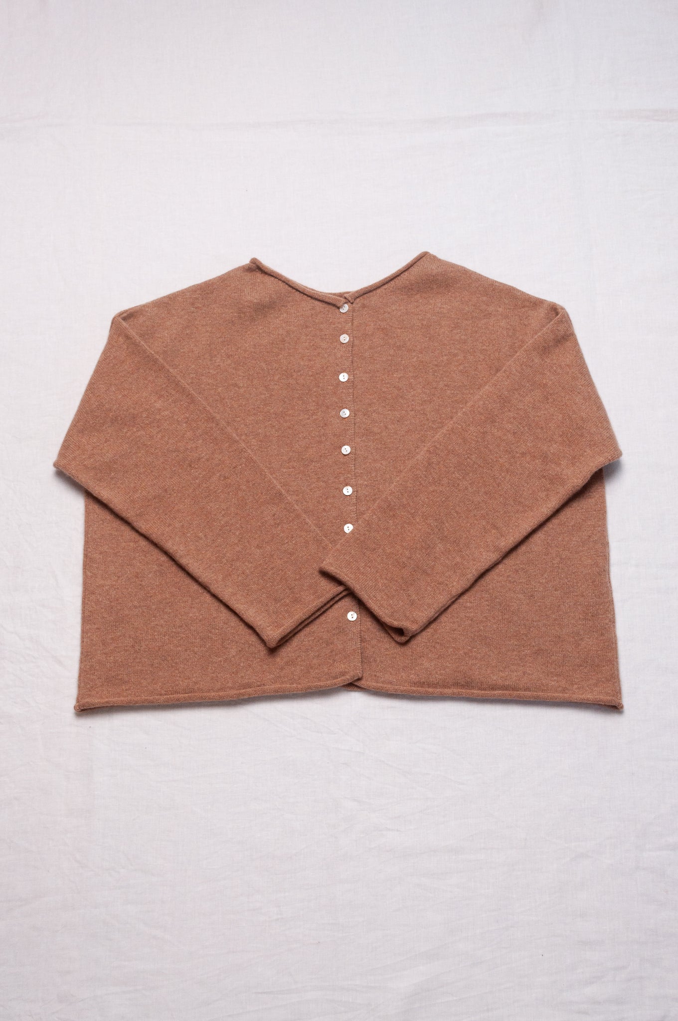 One size reversible cashmere cardigan in camel.