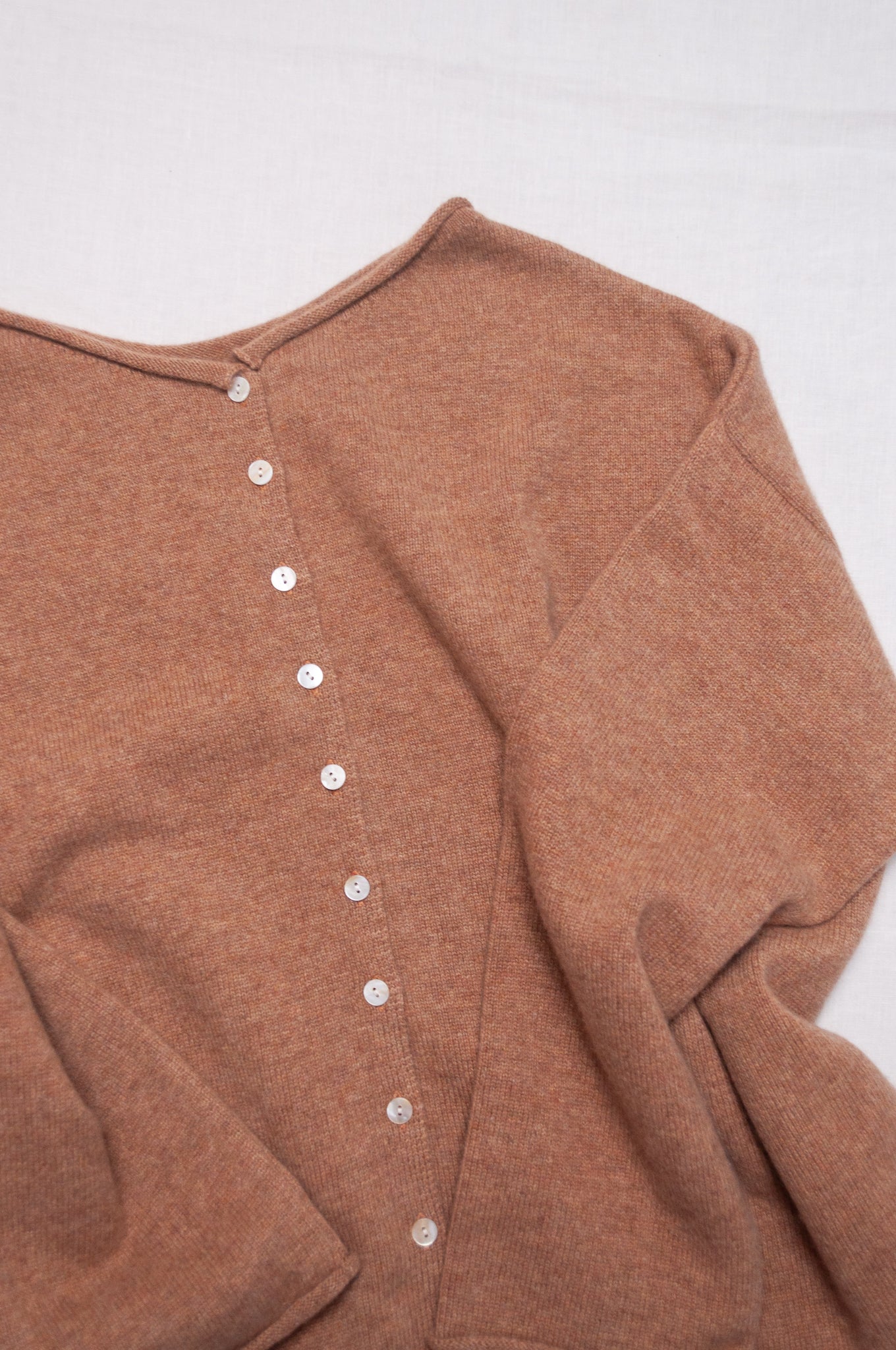 One size reversible cashmere cardigan in camel.