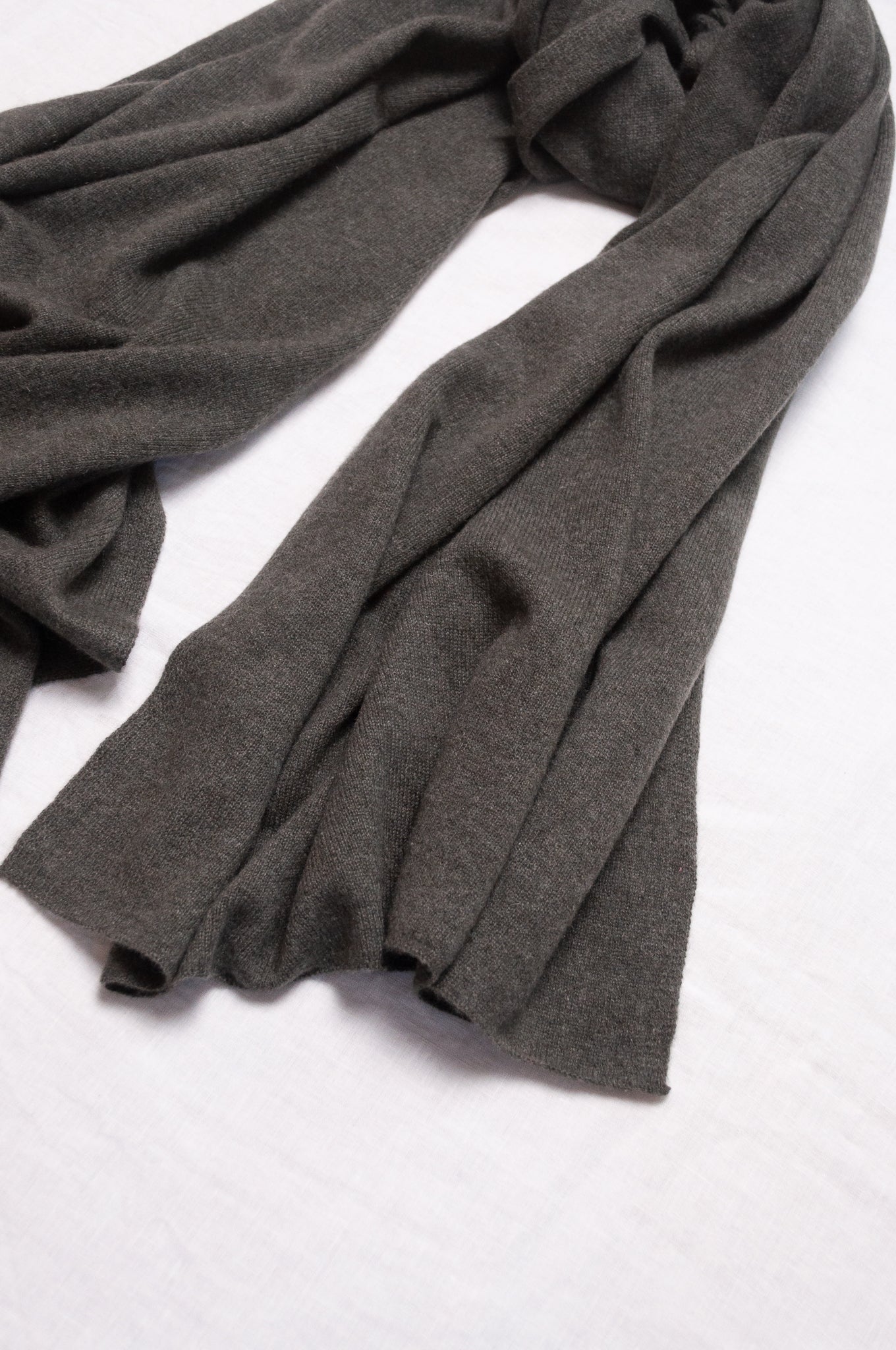 Juniper Hearth pure cashmere cosy scarf in moor green.