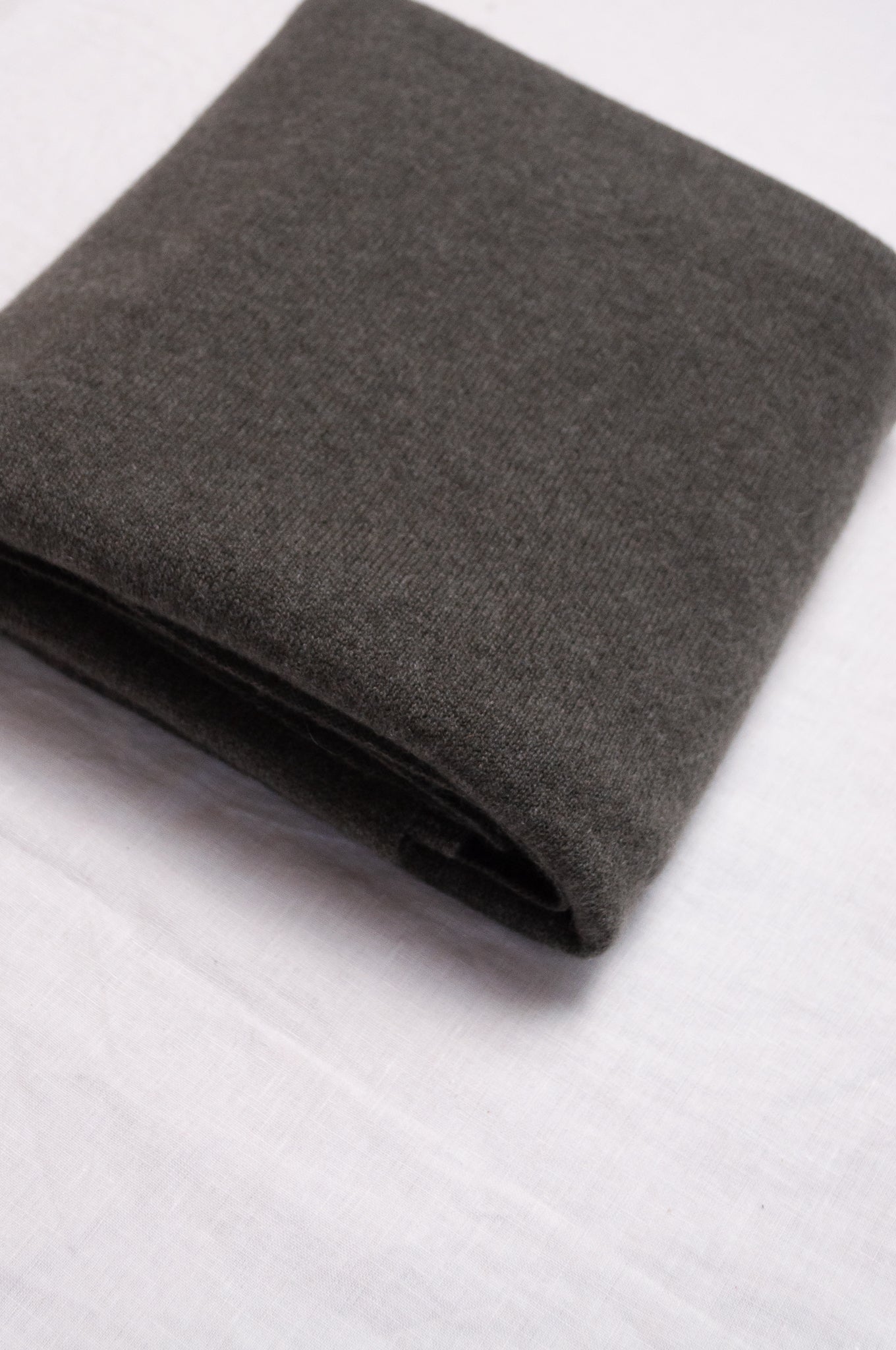 Juniper Hearth pure cashmere cosy scarf in moor green.