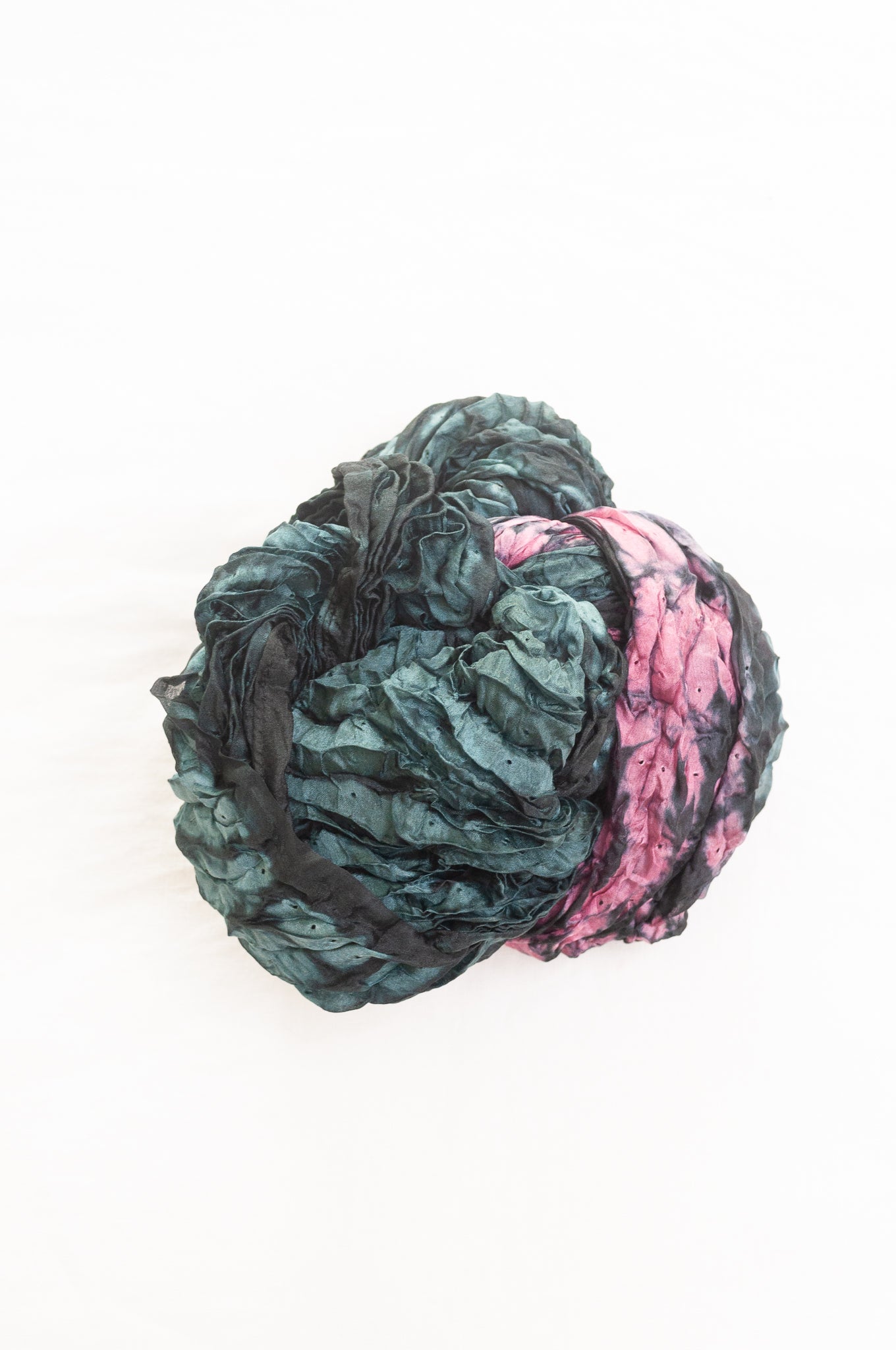 Shibori dyed pure silk crinkle finish scarf in indigo blue and magenta pink.