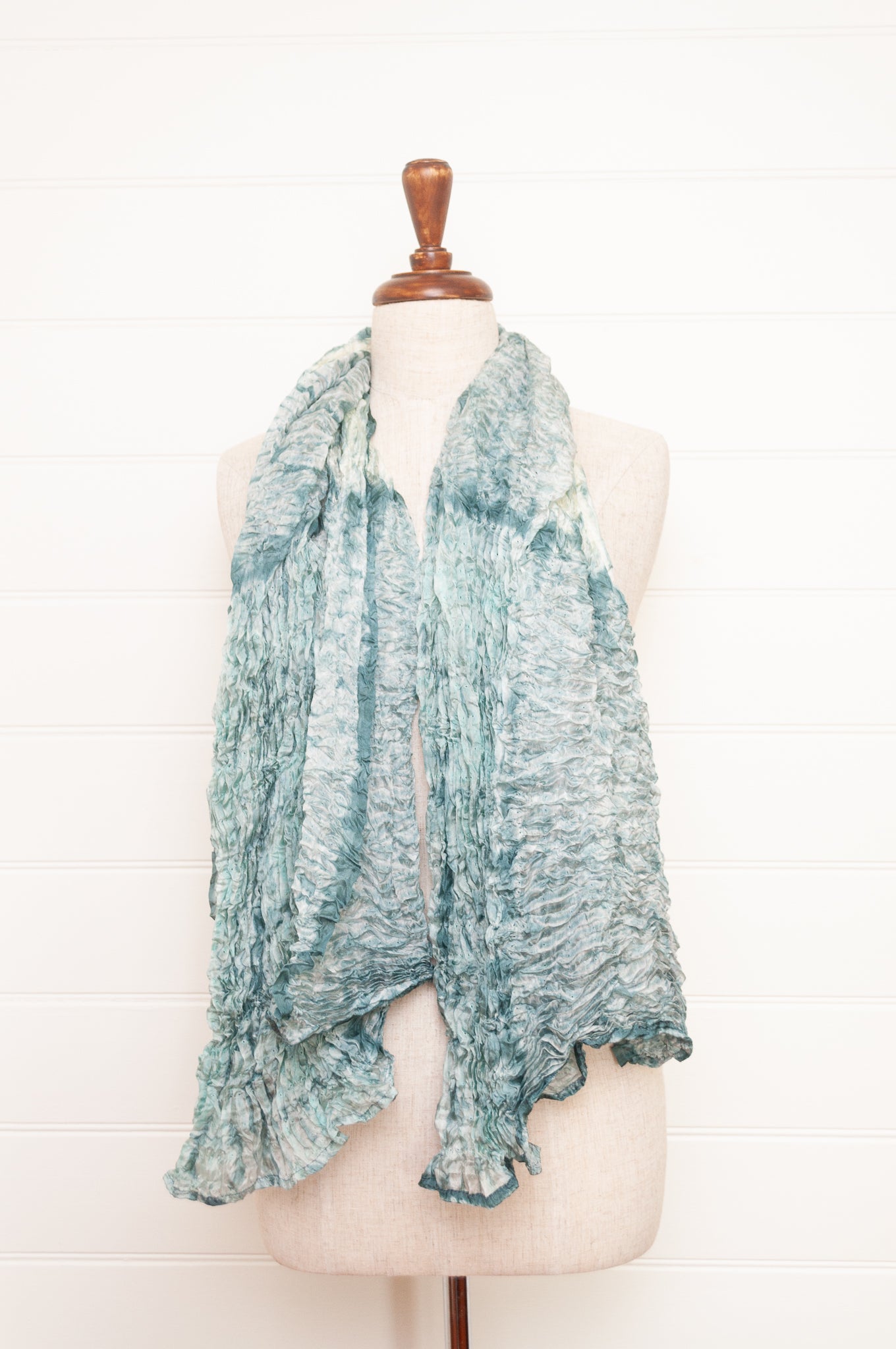 Shibori dyed pure silk crinkle finish scarf in pale blue and white.