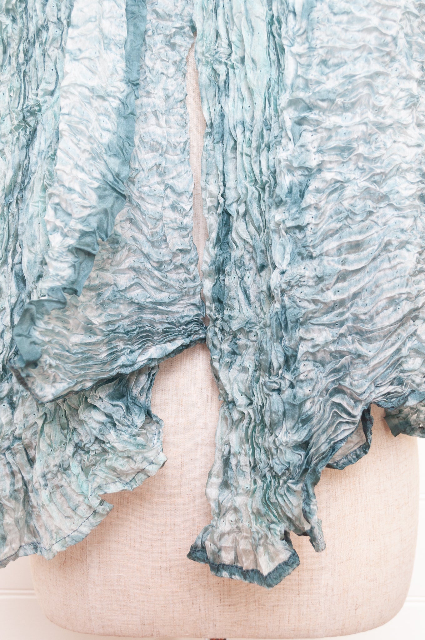 Shibori dyed pure silk crinkle finish scarf in pale blue and white.