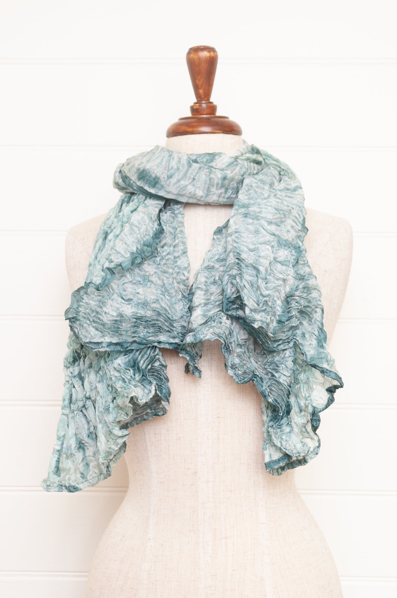 Shibori dyed pure silk crinkle finish scarf in pale blue and white.