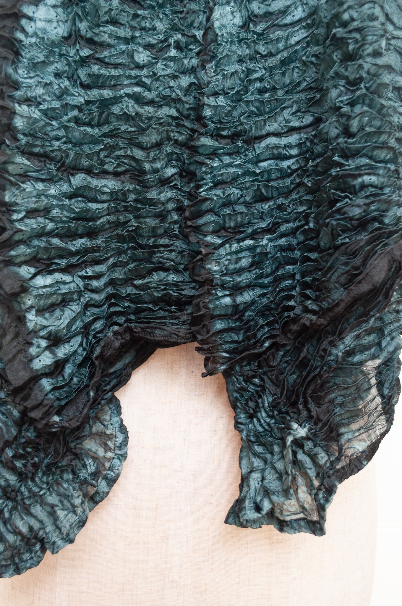 Shibori dyed pure silk crinkle finish scarf in indigo blue and magenta pink.