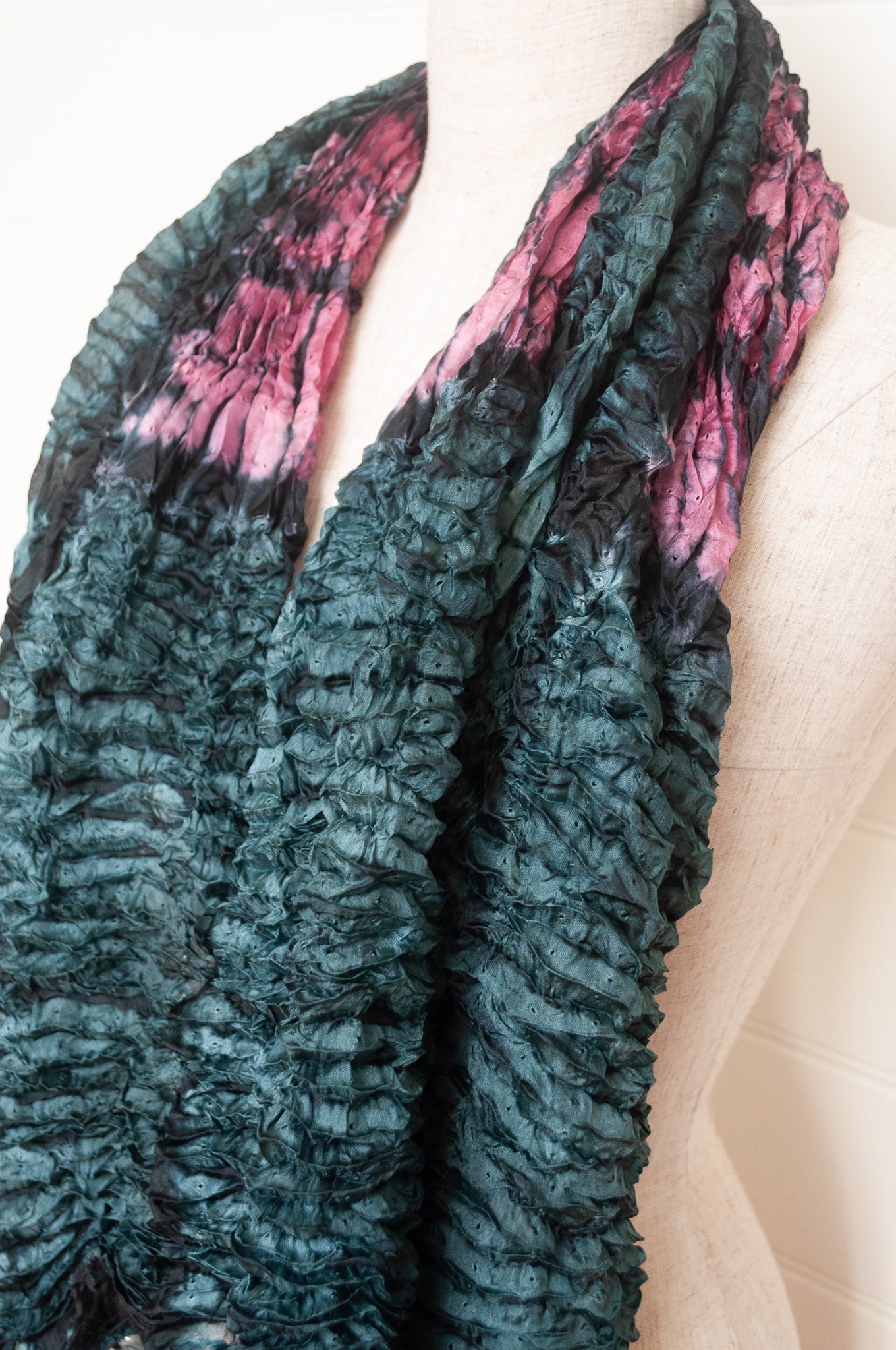 Shibori dyed pure silk crinkle finish scarf in indigo blue and magenta pink.