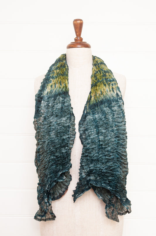 Shibori dyed pure silk crinkle finish scarf in shades of green and blue.