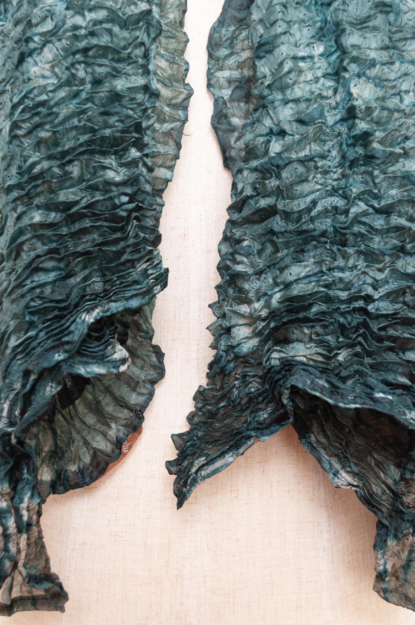 Shibori dyed pure silk crinkle finish scarf in shades of green and blue.
