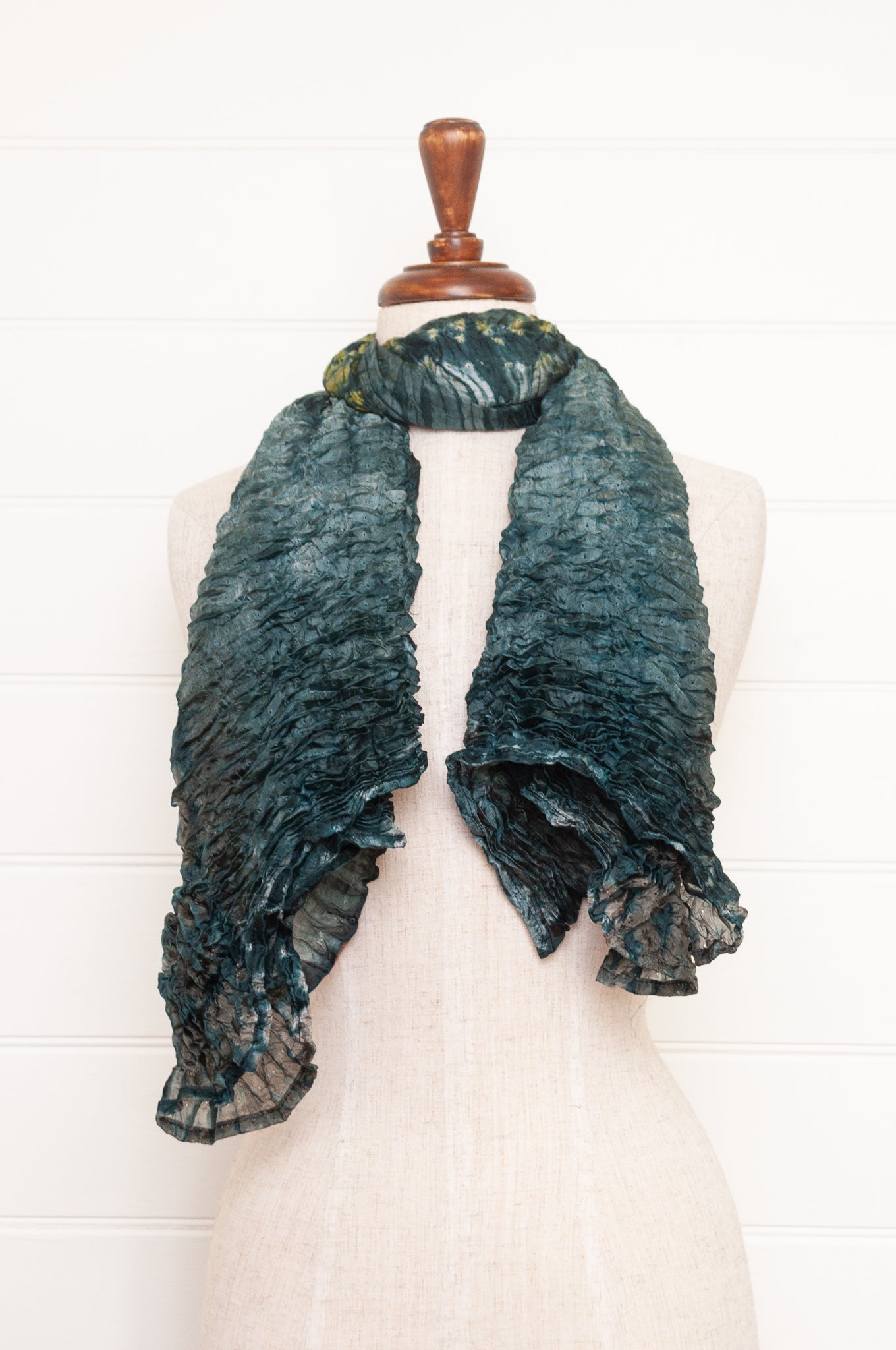 Shibori dyed pure silk crinkle finish scarf in shades of green and blue.