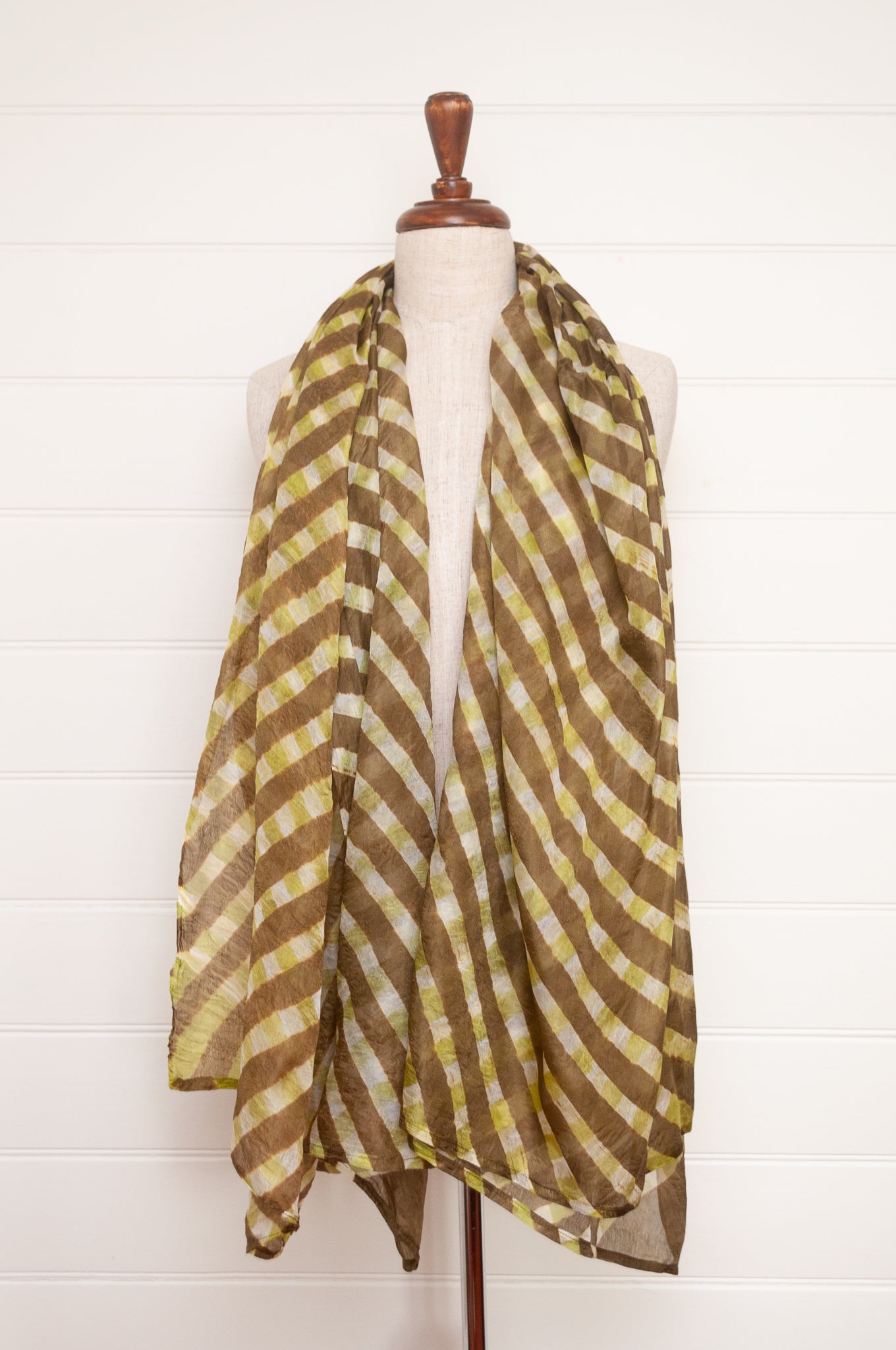 Hand painted pure silk scarf with deep olive green checks on white.