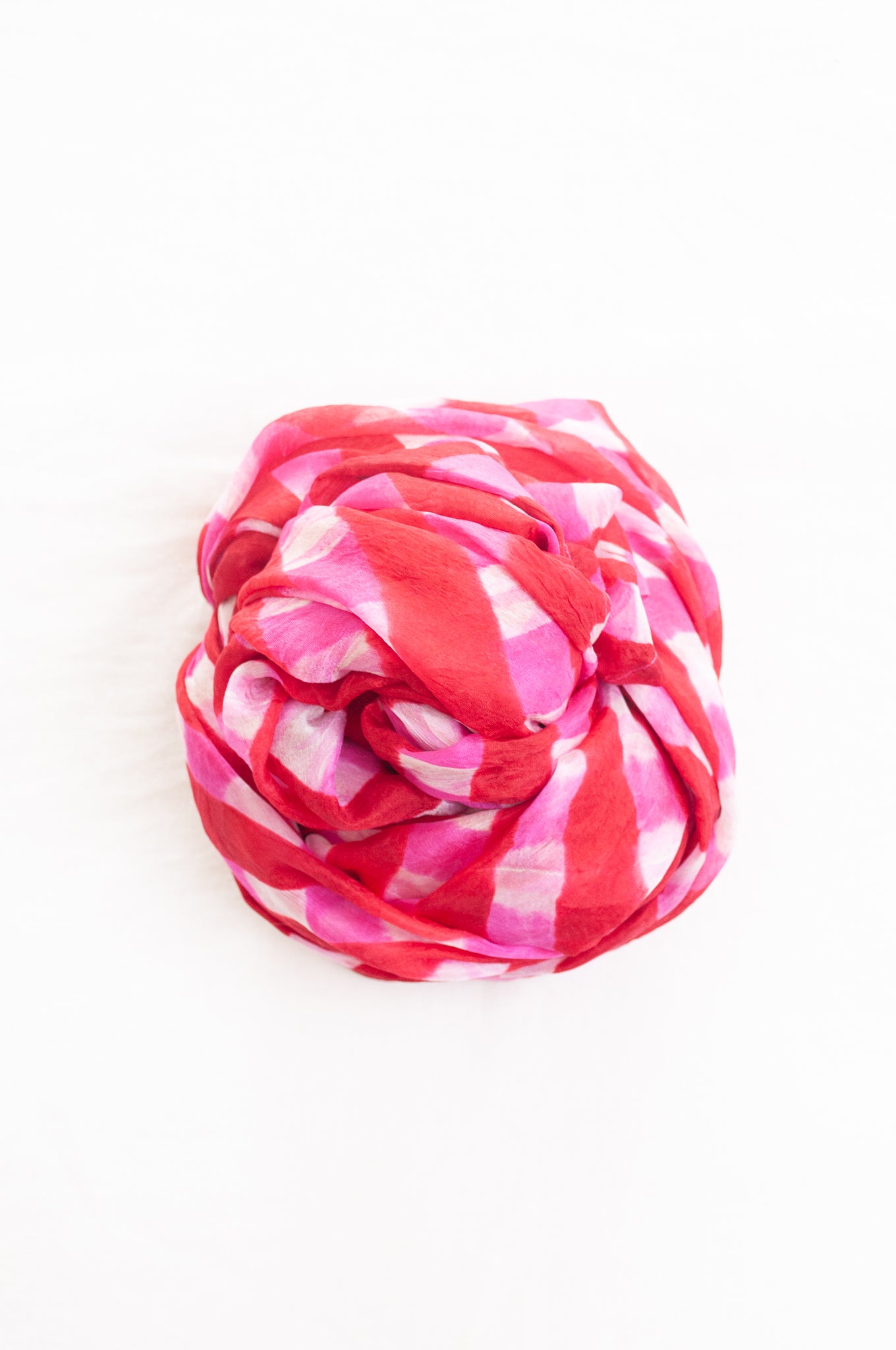 Hand painted pure silk scarf with deep red and pink checks on white.