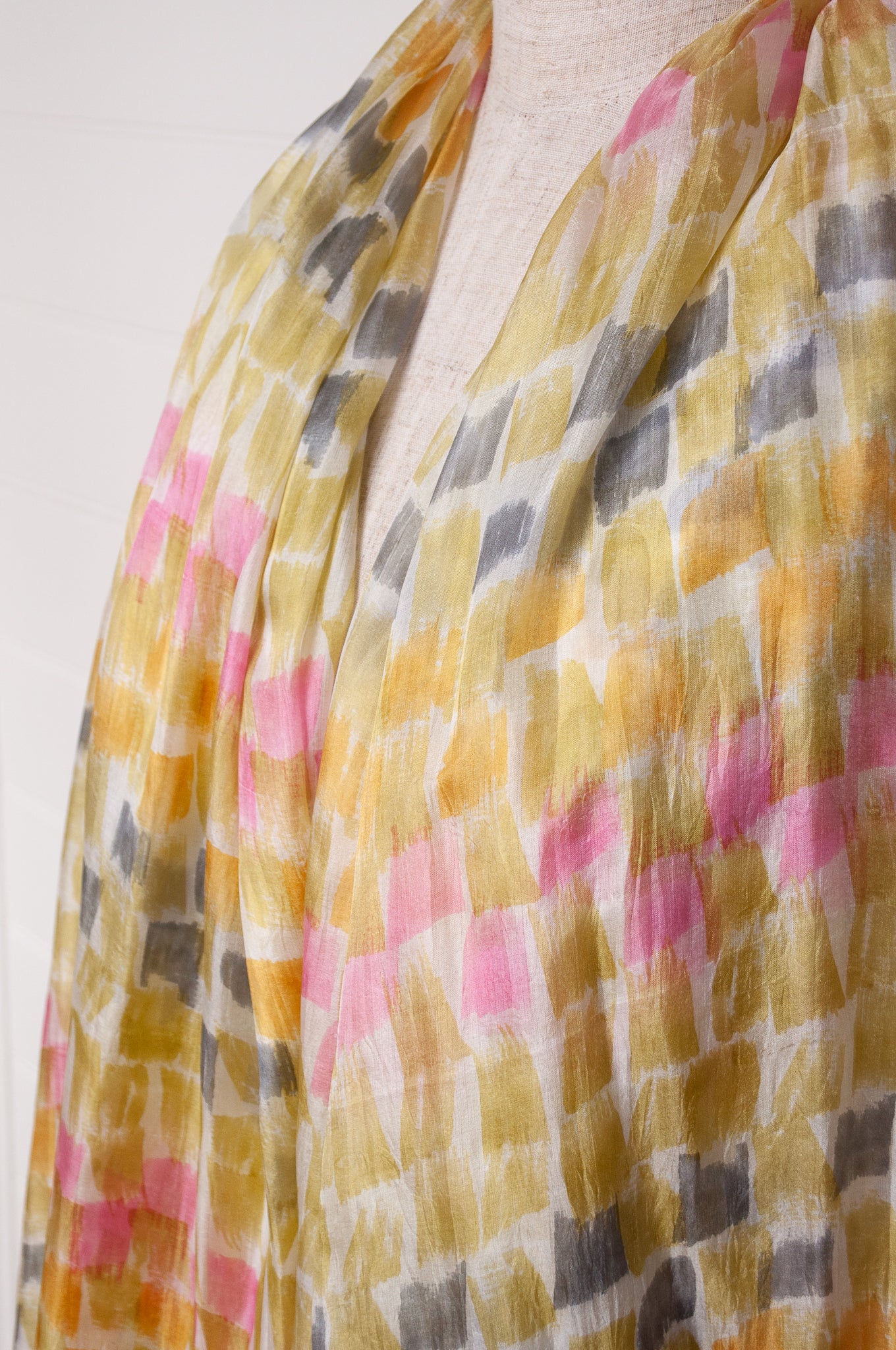 Hand painted pure silk scarf with light olive, pink and grey brushstrokes on white.