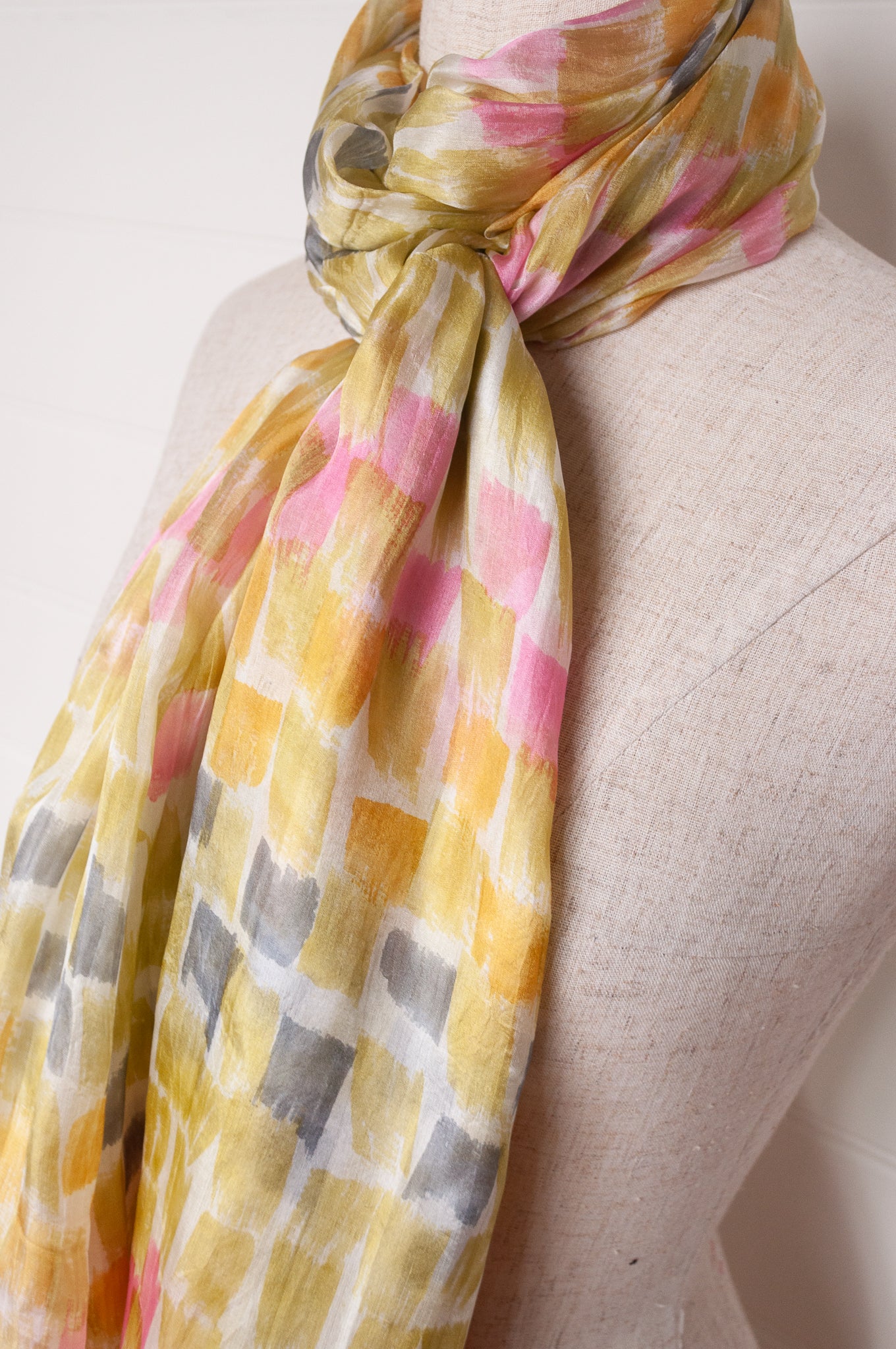 Hand painted pure silk scarf with light olive, pink and grey brushstrokes on white.