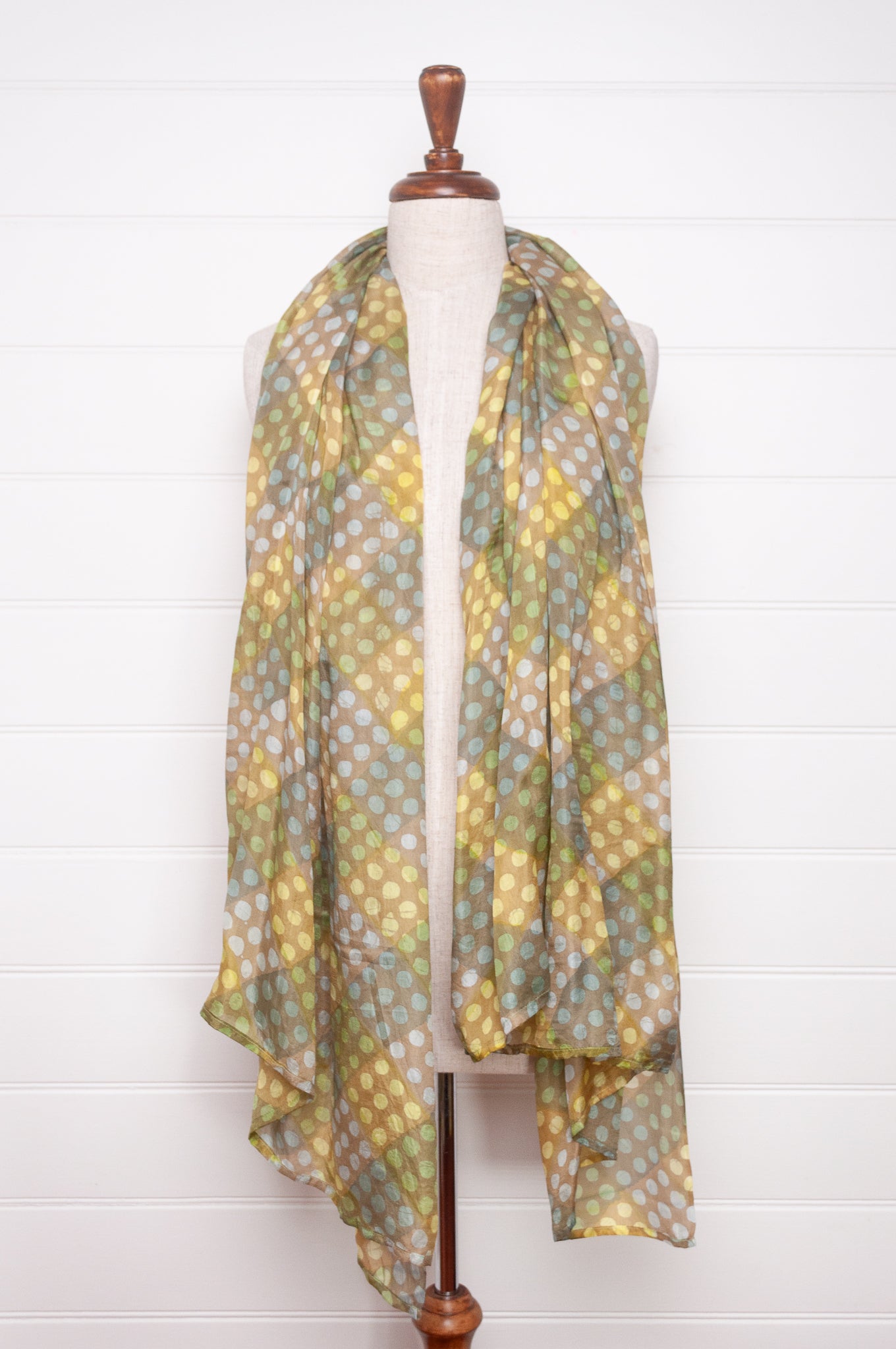Pure silk shibori dyed  scarf in bands of aqua and light olive.