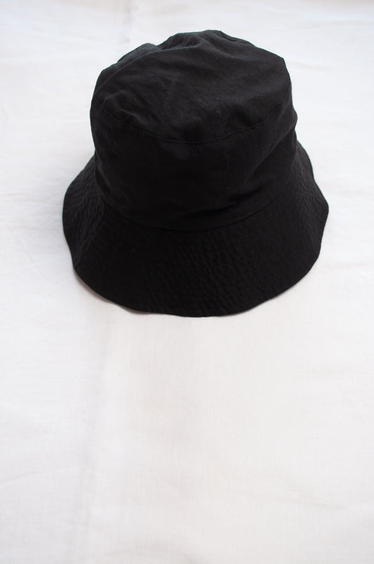PCNQ Luna made in Japan black foldable linen fabric bucket hat.