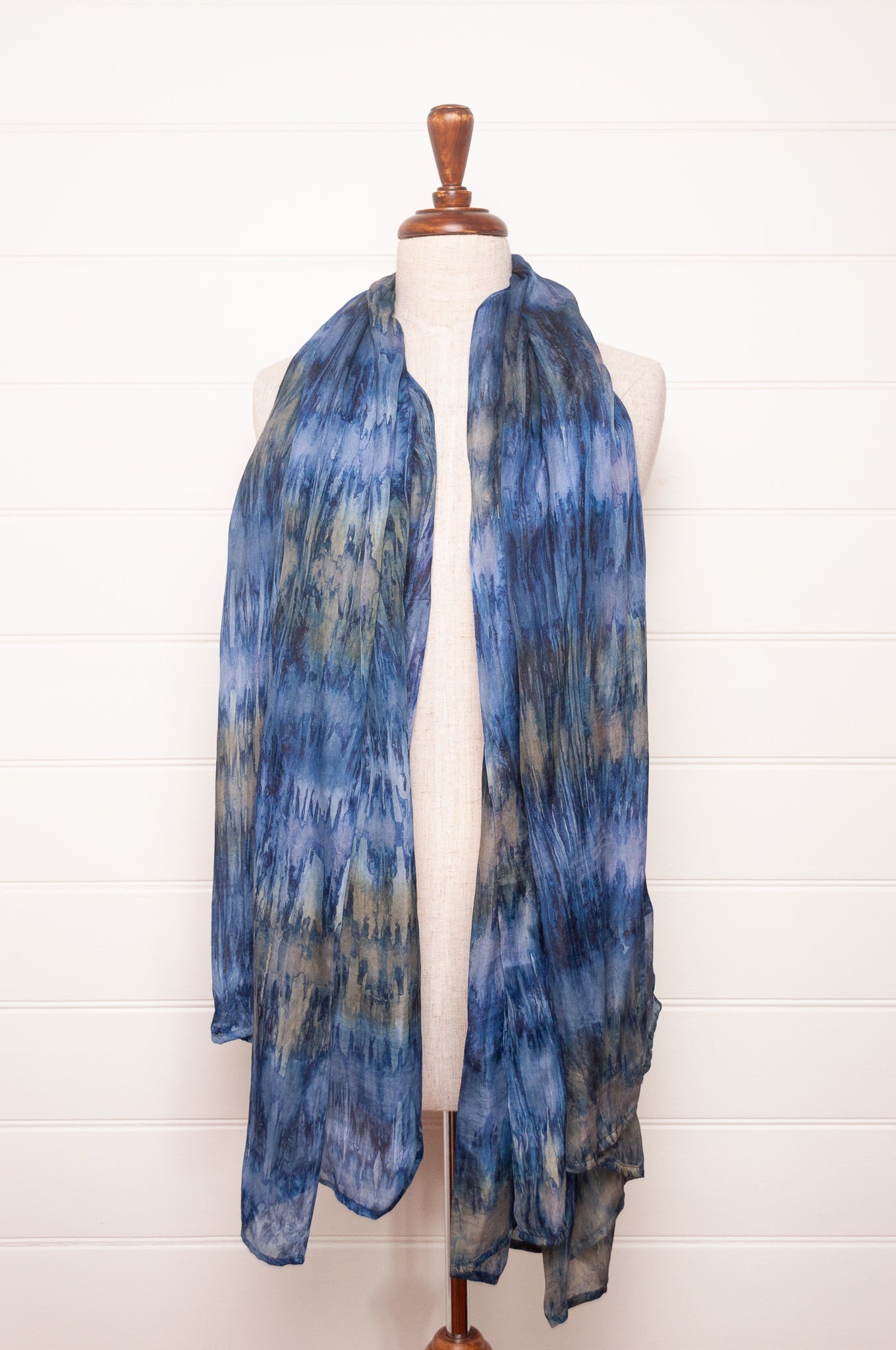 Pure silk shibori dyed scarf in shades of denim blue.