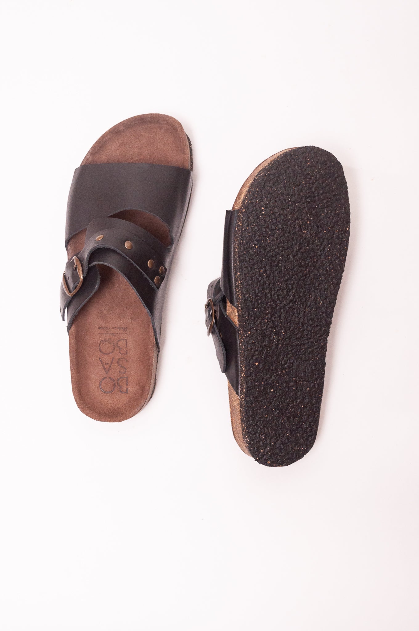 Bosabo black leather slide Vachette nero with brass stud detail and buckle.