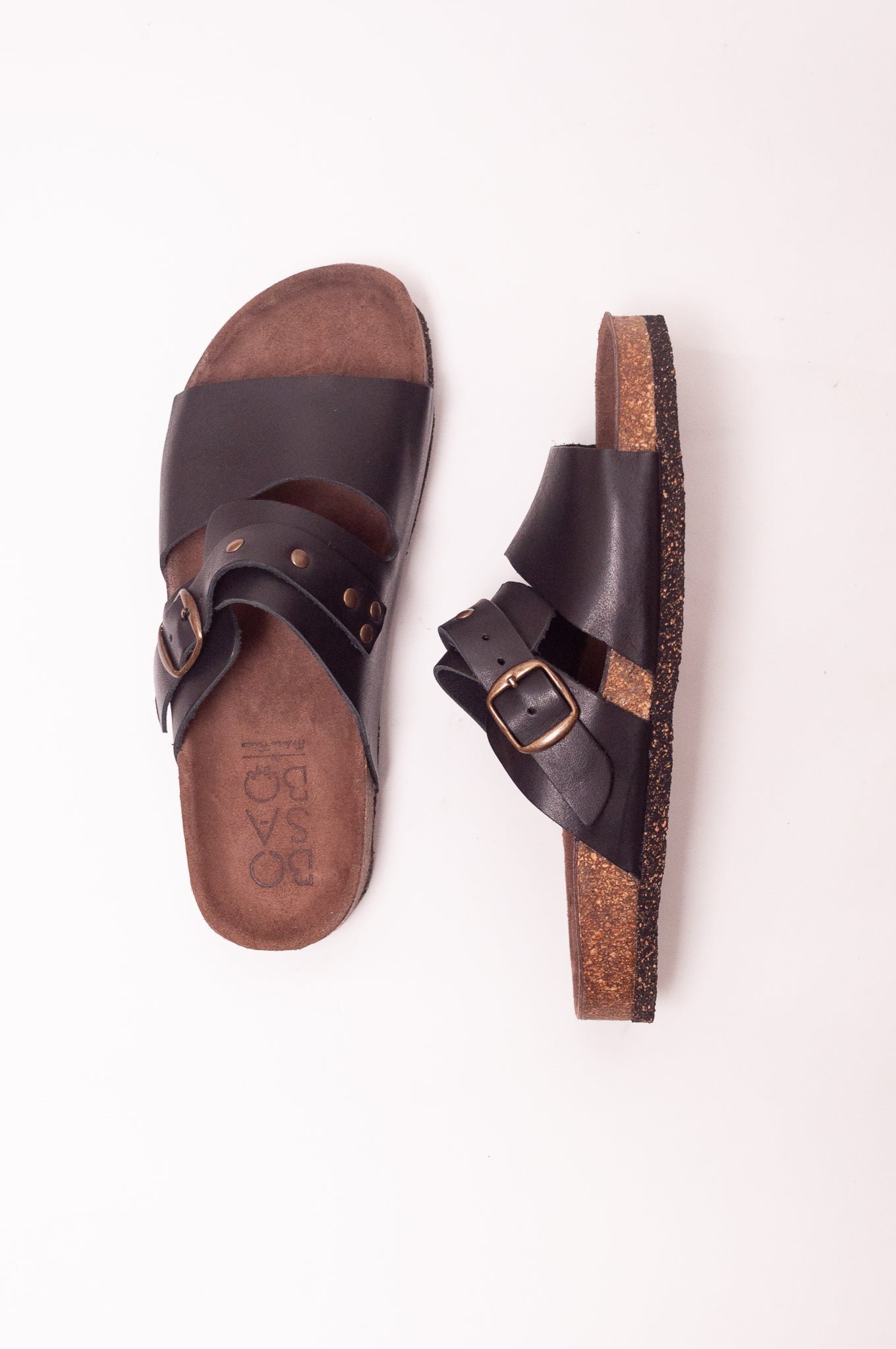 Bosabo black leather slide Vachette nero with brass stud detail and buckle.