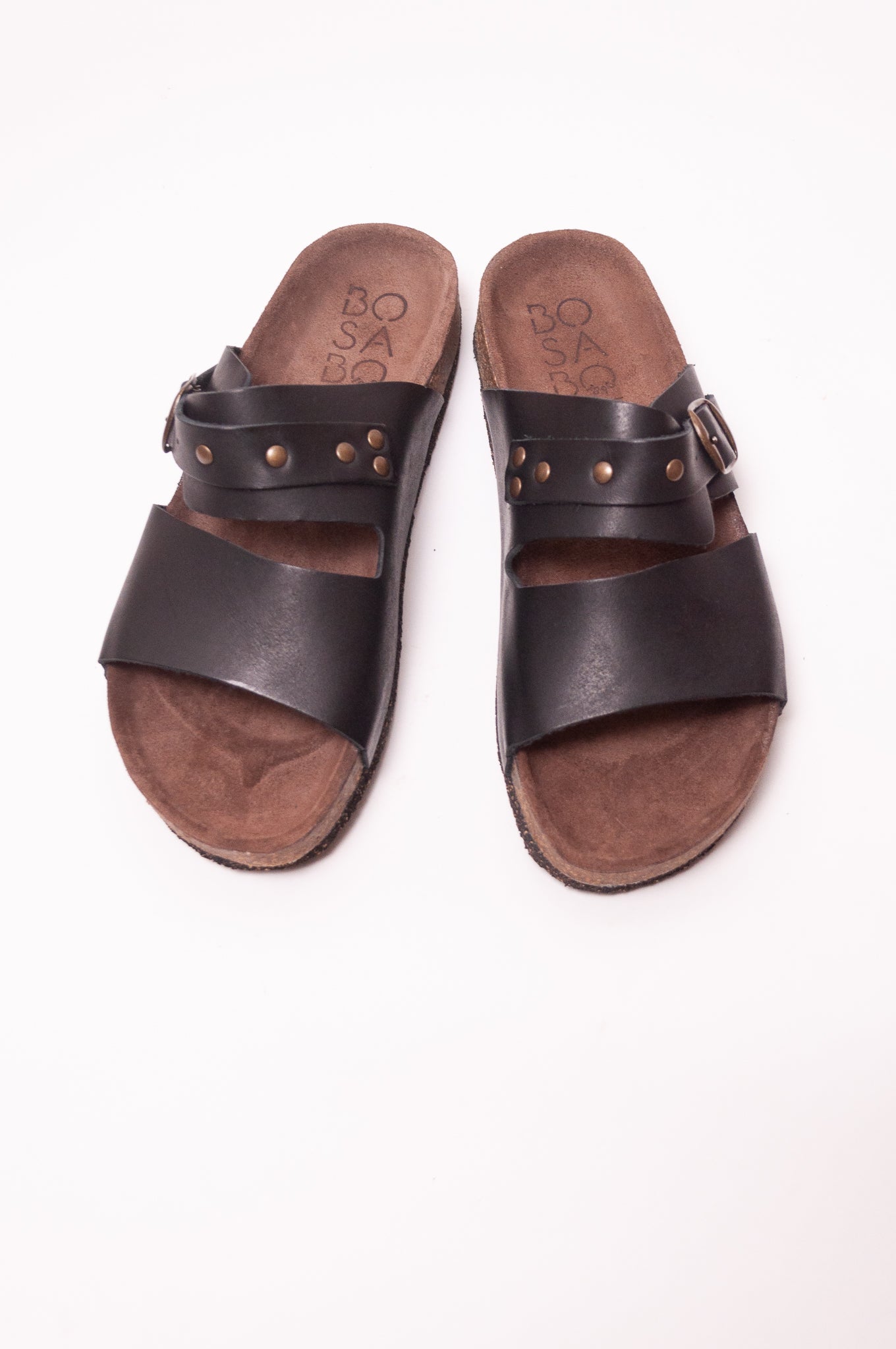 Bosabo black leather slide Vachette nero with brass stud detail and buckle.