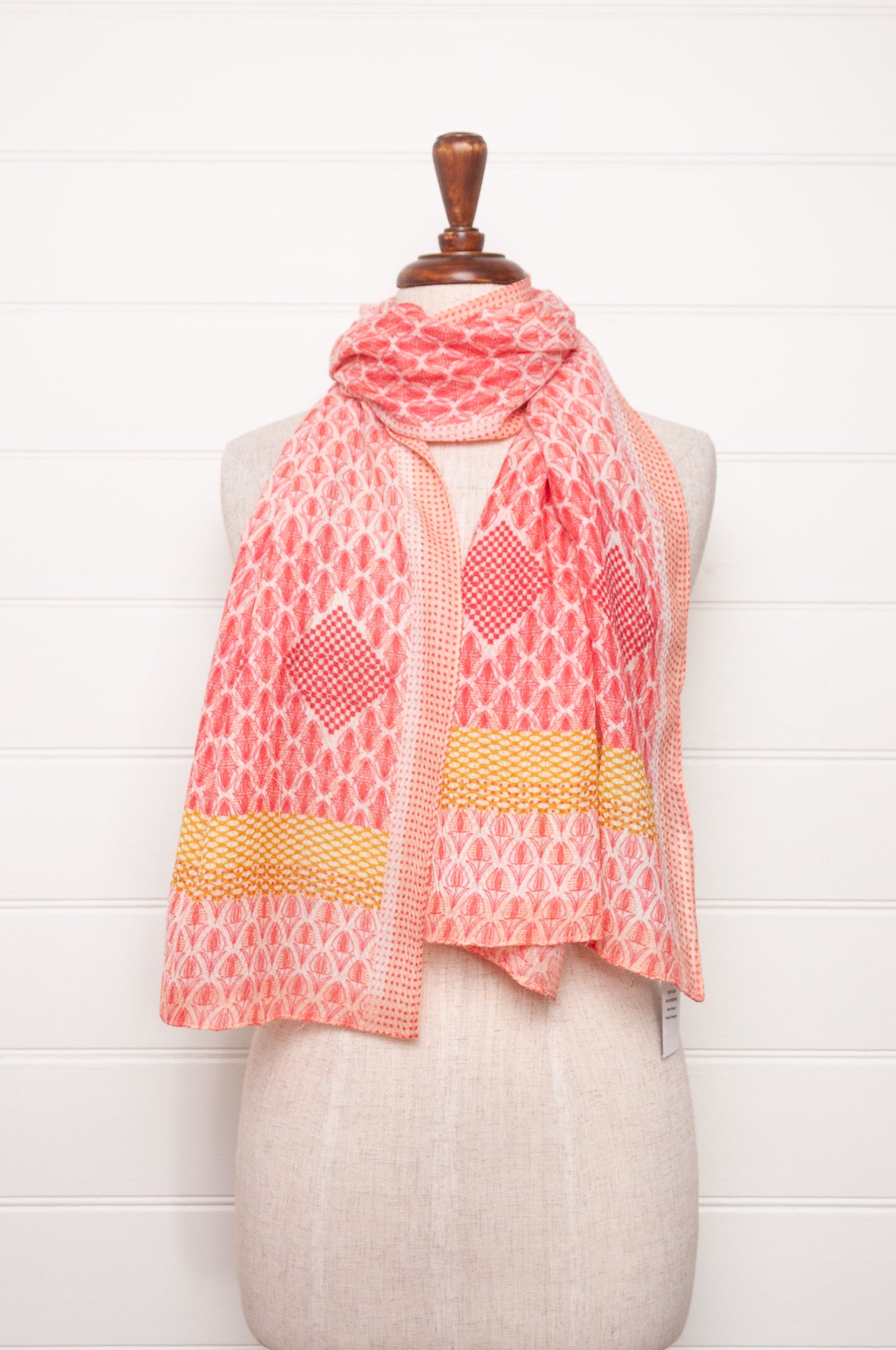 Anna Kaszer fine wool scarf geometric pattern in coral, white and mustard.