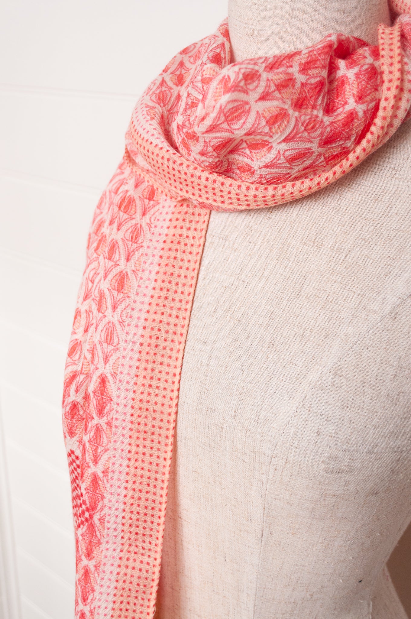 Anna Kaszer fine wool scarf geometric pattern in coral, white and mustard.