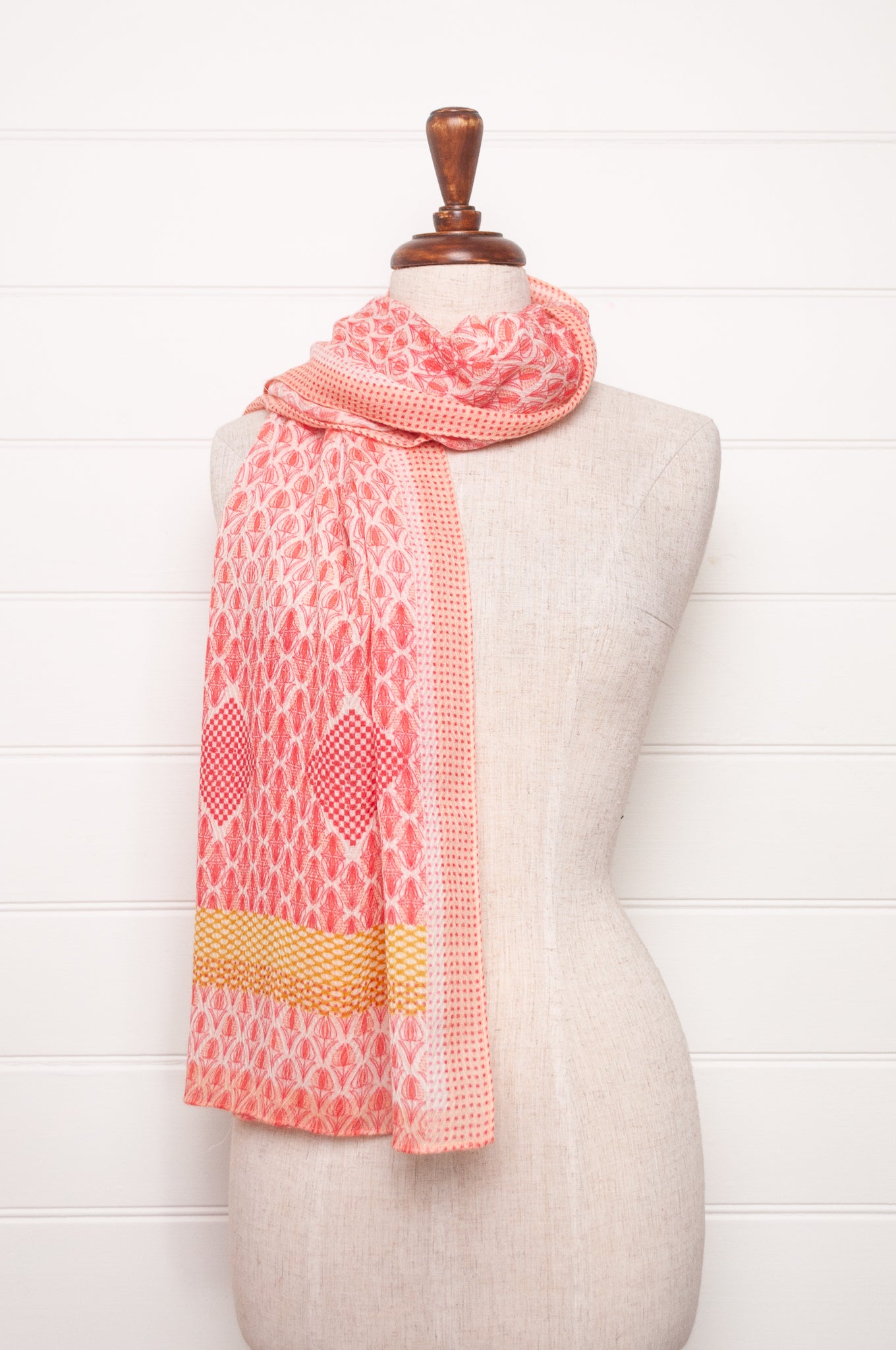 Anna Kaszer fine wool scarf geometric pattern in coral, white and mustard.