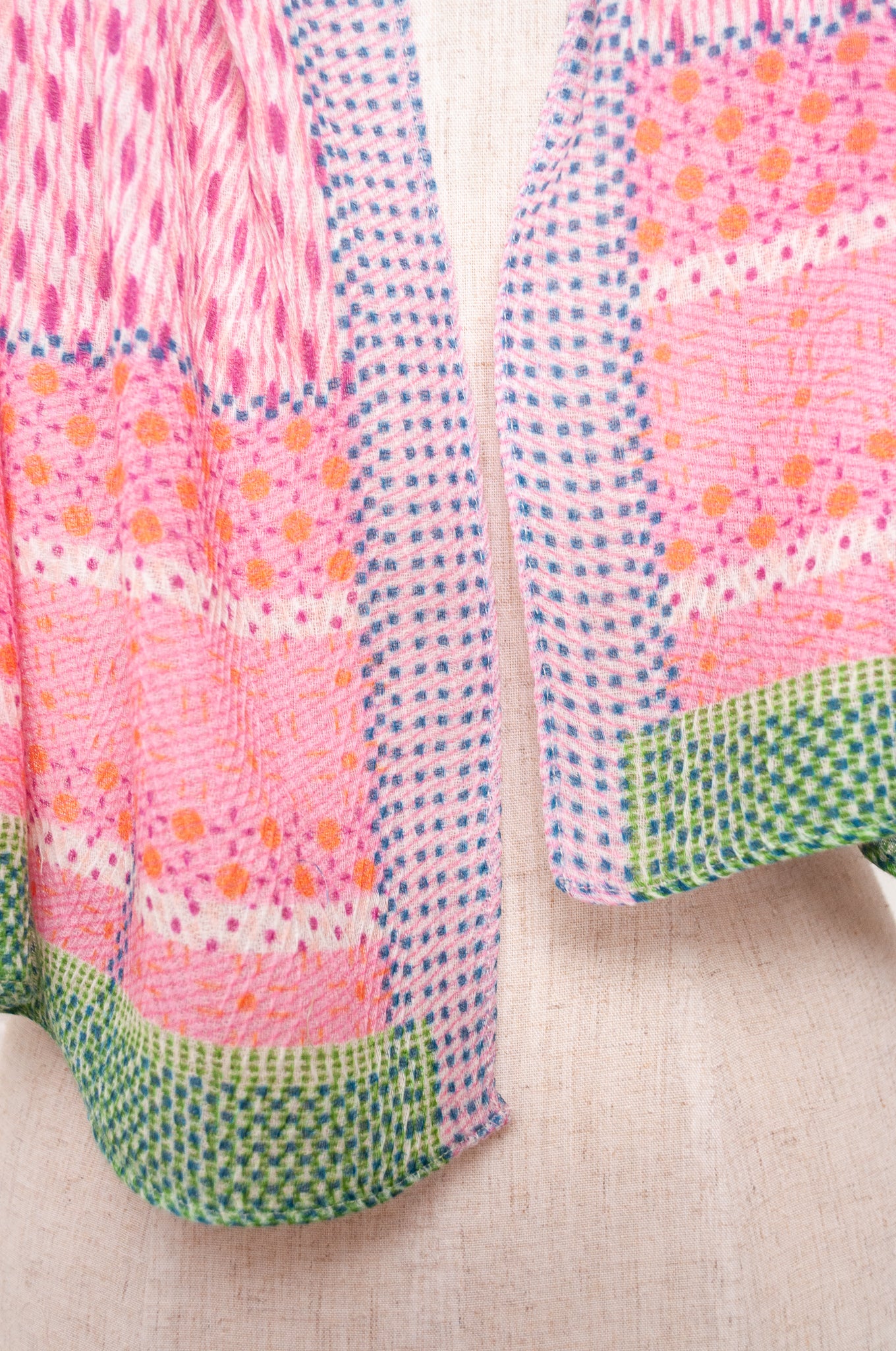 Anna Kaszer fine wool patterned scarf in pink with blue and green highlights.