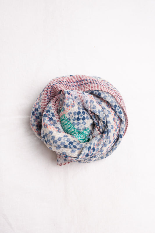 Anna Kaszer fine wool scarf Marti Inosa blue and white geometric flower pattern with green and red highlights.