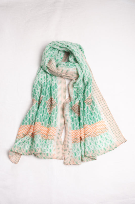 Anna Kaszer fine wool scarf Pouki tonic green and white geometric with coral highlights.